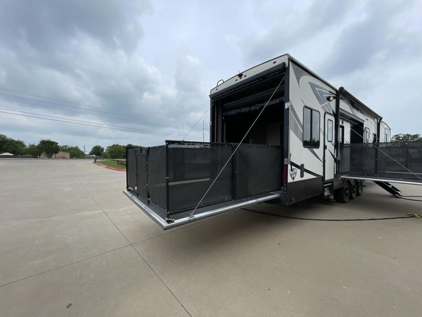 2019 HEARTLAND ROAD WARRIOR 427RW (5SFCG4435KE) , Length: 44.08 ft. | Dry Weight: 16,400 lbs. | Gross Weight: 20,000 lbs. | Slides: 2 transmission, located at 4319 N Main St, Cleburne, TX, 76033, (817) 678-5133, 32.385960, -97.391212 - The 2019 Heartland Road Warrior 427RW fifth wheel toy hauler is ready for your next journey. The length of this amazing RV is 44.08 feet, its dry weight is 16,400 lbs and its gross weight is 20,000 lbs. This makes it stable and long-lasting on the road. This RV is strong and stylish, with two slides - Photo#26