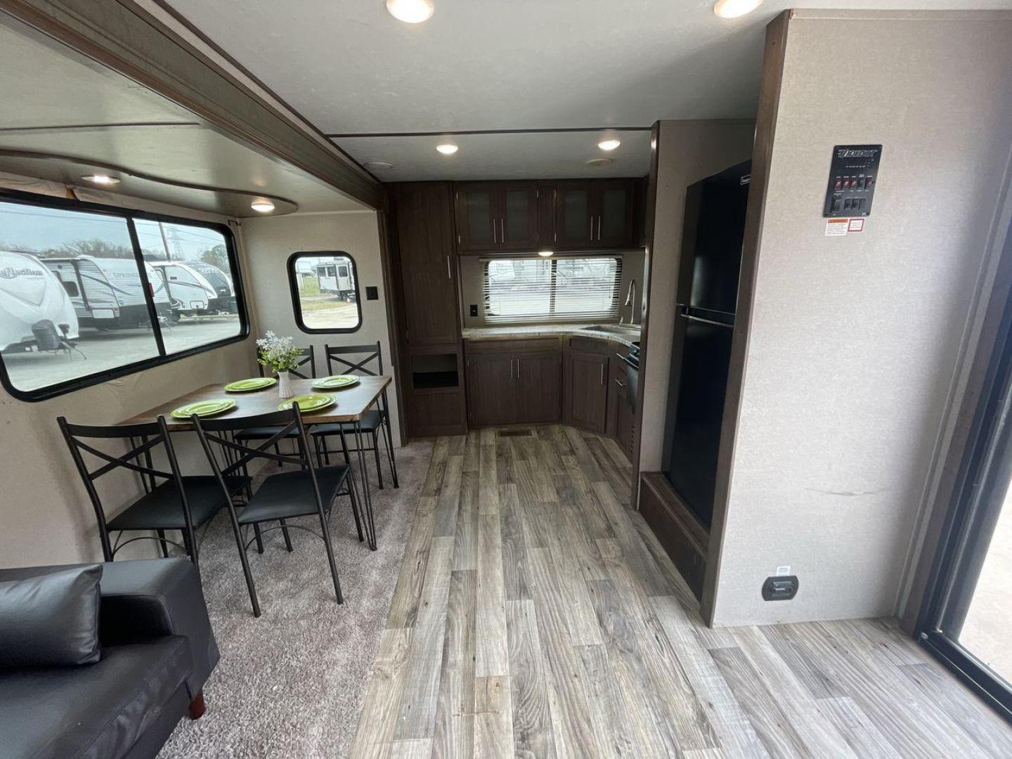 2019 WHITE HIDEOUT 38FKTS - (4YDT38F24K7) , Length: 39.92 ft. | Dry Weight: 9,275 lbs. | Gross Weight: 11,000 lbs. | Slides: 3 transmission, located at 4319 N Main St, Cleburne, TX, 76033, (817) 678-5133, 32.385960, -97.391212 - The 2019 Hideout 38FKTS travel trailer will surely make your camping experience unforgettable. This unit measures 39.92 ft in length, 8 ft in width, 11.33 ft in height, and 6.75 ft in interior height. It has a dry weight of 9,275 lbs with a payload capacity of 1,725 lbs. The GVWR is about 11,000 lbs - Photo#13