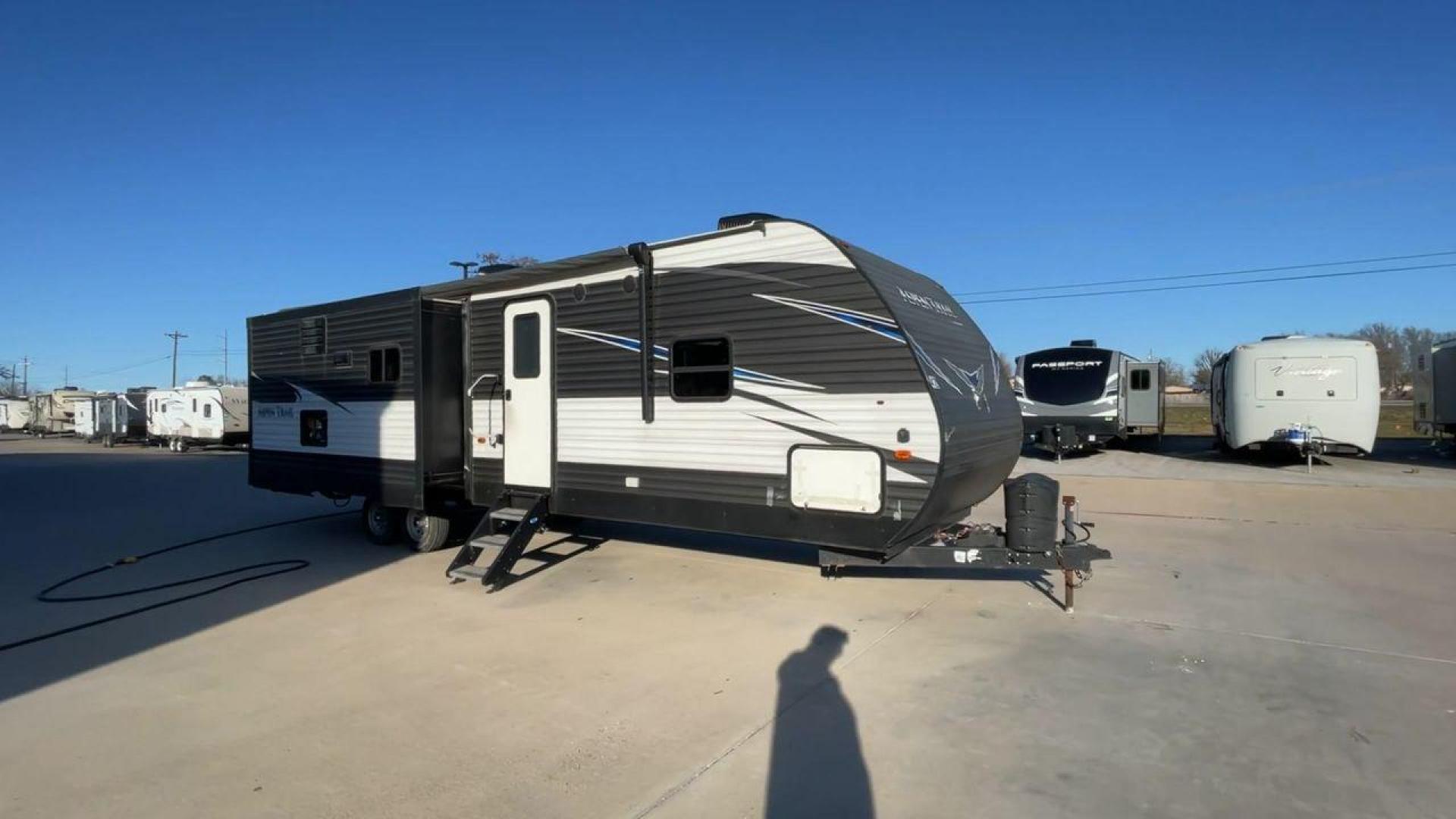 2019 WHITE KEYSTONE ASPEN TRAIL 3070RLS (4YDT30723K8) , Length: 34.92 ft. | Dry Weight: 7,333 lbs. | Slides: 2 transmission, located at 4319 N Main St, Cleburne, TX, 76033, (817) 678-5133, 32.385960, -97.391212 - The 2019 Aspen Trail 3070RLS by Keystone is a meticulously designed travel trailer that combines style and functionality. With dimensions measuring 34.92 ft in length, 8 ft in width, 11.17 ft in height, and an interior height of 6.83 ft, this unit ensures a spacious and comfortable living experienc - Photo#3