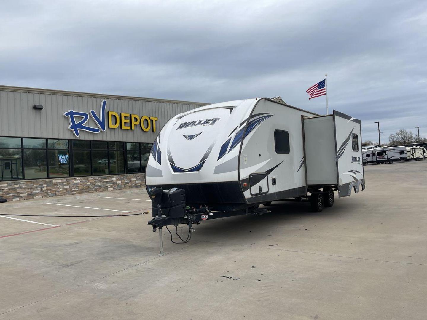 2019 KEYSTONE BULLET 248RKS (4YDT24821KT) , located at 4319 N Main St, Cleburne, TX, 76033, (817) 678-5133, 32.385960, -97.391212 - Discover extra features that contribute to making this RV an ideal investment. (1) Both the front and rear of the trailer have entry doors, providing convenient access and potentially enhancing ventilation options. (2) The 2019 Keystone Bullet 248RKS is significantly lighter than many similar-s - Photo#0