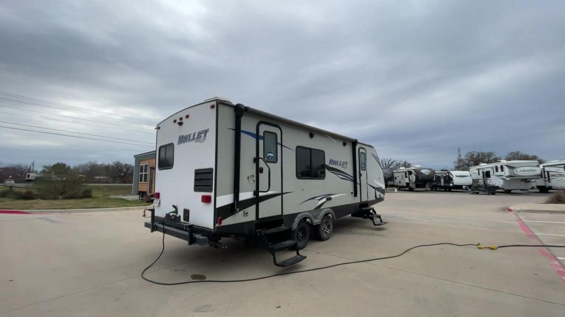 2019 KEYSTONE BULLET 248RKS (4YDT24821KT) , located at 4319 N Main St, Cleburne, TX, 76033, (817) 678-5133, 32.385960, -97.391212 - Discover extra features that contribute to making this RV an ideal investment. (1) Both the front and rear of the trailer have entry doors, providing convenient access and potentially enhancing ventilation options. (2) The 2019 Keystone Bullet 248RKS is significantly lighter than many similar-s - Photo#1