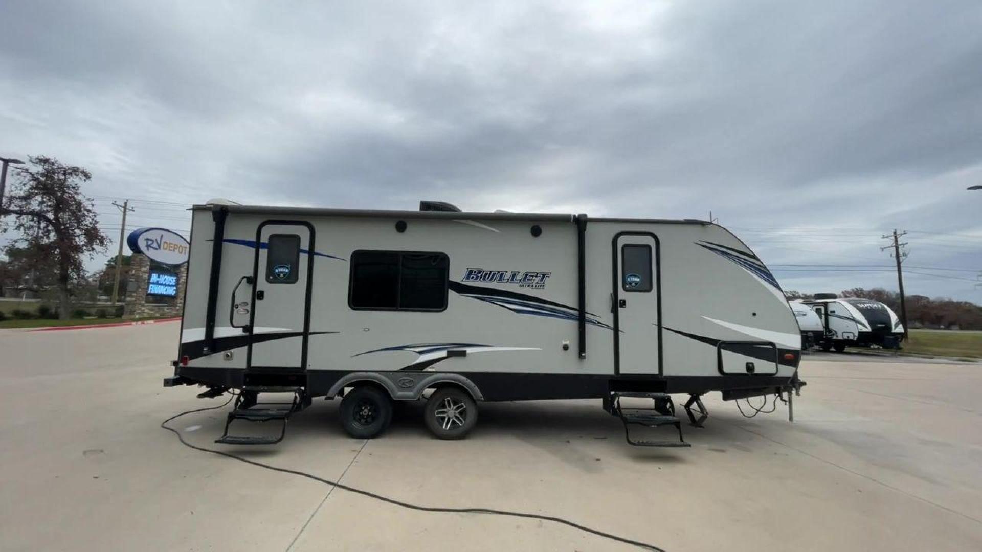 2019 KEYSTONE BULLET 248RKS (4YDT24821KT) , located at 4319 N Main St, Cleburne, TX, 76033, (817) 678-5133, 32.385960, -97.391212 - Discover extra features that contribute to making this RV an ideal investment. (1) Both the front and rear of the trailer have entry doors, providing convenient access and potentially enhancing ventilation options. (2) The 2019 Keystone Bullet 248RKS is significantly lighter than many similar-s - Photo#2