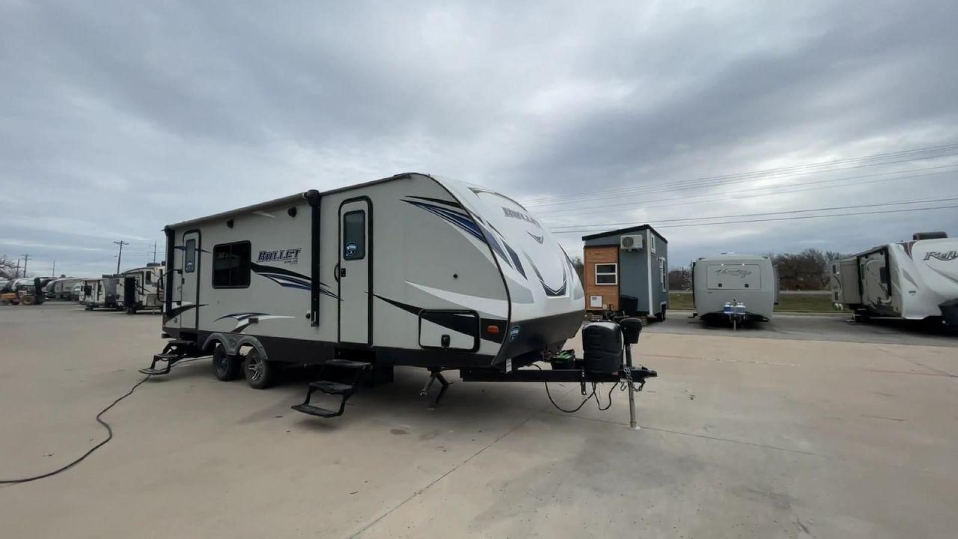 2019 KEYSTONE BULLET 248RKS (4YDT24821KT) , located at 4319 N Main St, Cleburne, TX, 76033, (817) 678-5133, 32.385960, -97.391212 - Discover extra features that contribute to making this RV an ideal investment. (1) Both the front and rear of the trailer have entry doors, providing convenient access and potentially enhancing ventilation options. (2) The 2019 Keystone Bullet 248RKS is significantly lighter than many similar-s - Photo#3