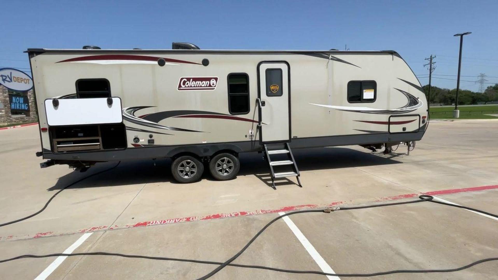 2019 KEYSTONE COLEMAN 2825RK (4YDT28226KM) , Length: 32.92 ft. | Dry Weight: 6,522 lbs. | Slides: 1 transmission, located at 4319 N Main St, Cleburne, TX, 76033, (817) 678-5133, 32.385960, -97.391212 - The 2019 Keystone Coleman 2825RK is intended for comfort and convenience. It measures 32.92 feet long and weighs 6,522 pounds dry. It has a single slide-out that greatly increases the inside room. The outside, streamlined with a clean, neutral color palette highlighted with red and black graphics, p - Photo#2