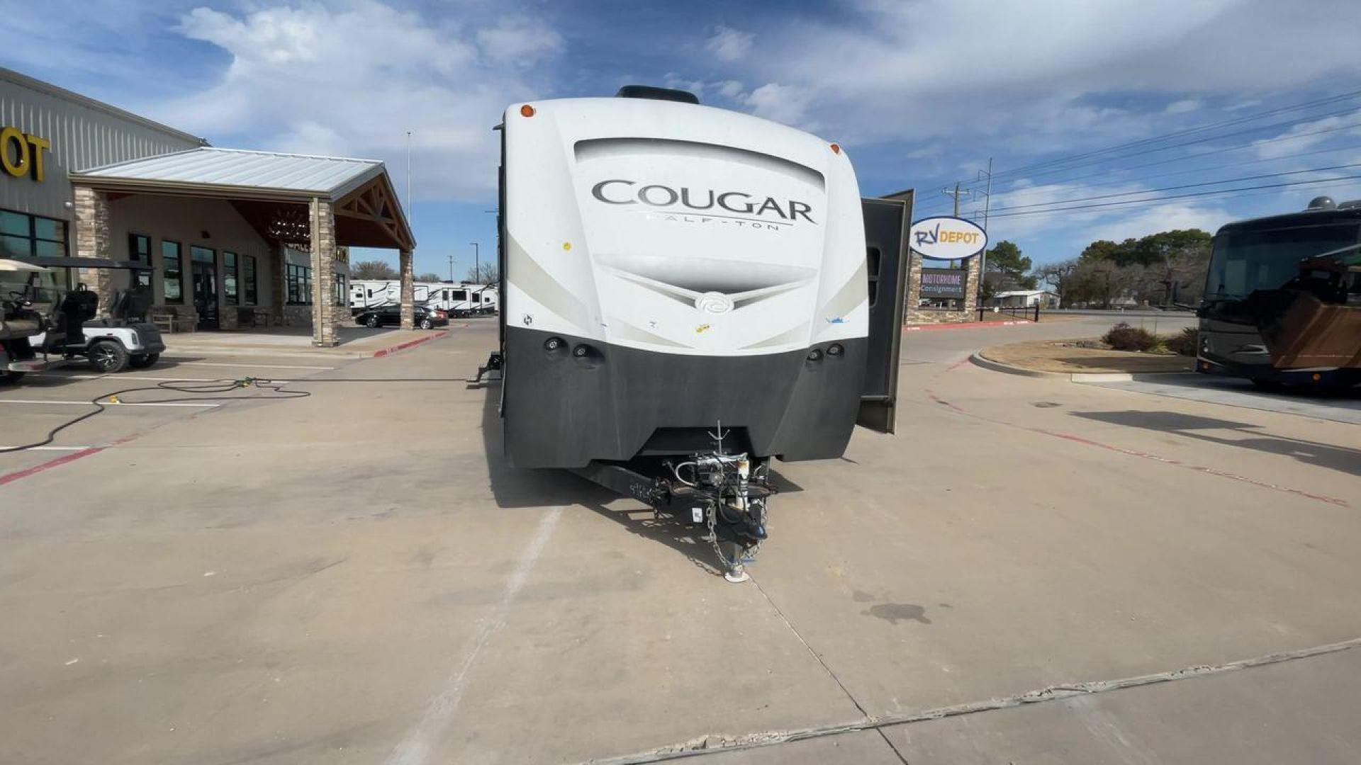 2019 TAN KEYSTONE COUGAR 29RLD (4YDT29R22JV) , Length: 34 ft. | Dry Weight: 7,380 lbs. | Gross Weight: 9,560 lbs. | Slides: 2 transmission, located at 4319 N Main St, Cleburne, TX, 76033, (817) 678-5133, 32.385960, -97.391212 - The 2019 Keystone Cougar 29RLD is a dual-axle aluminum wheel set-up measuring exactly 34 ft. in length. It has a dry weight of 7,380 lbs. and a GVWR of 9,560 lbs. Its exterior is a base color of tan with black and white accents. It comes with automatic heating and cooling rated at 35,000 and 15,000 - Photo#4