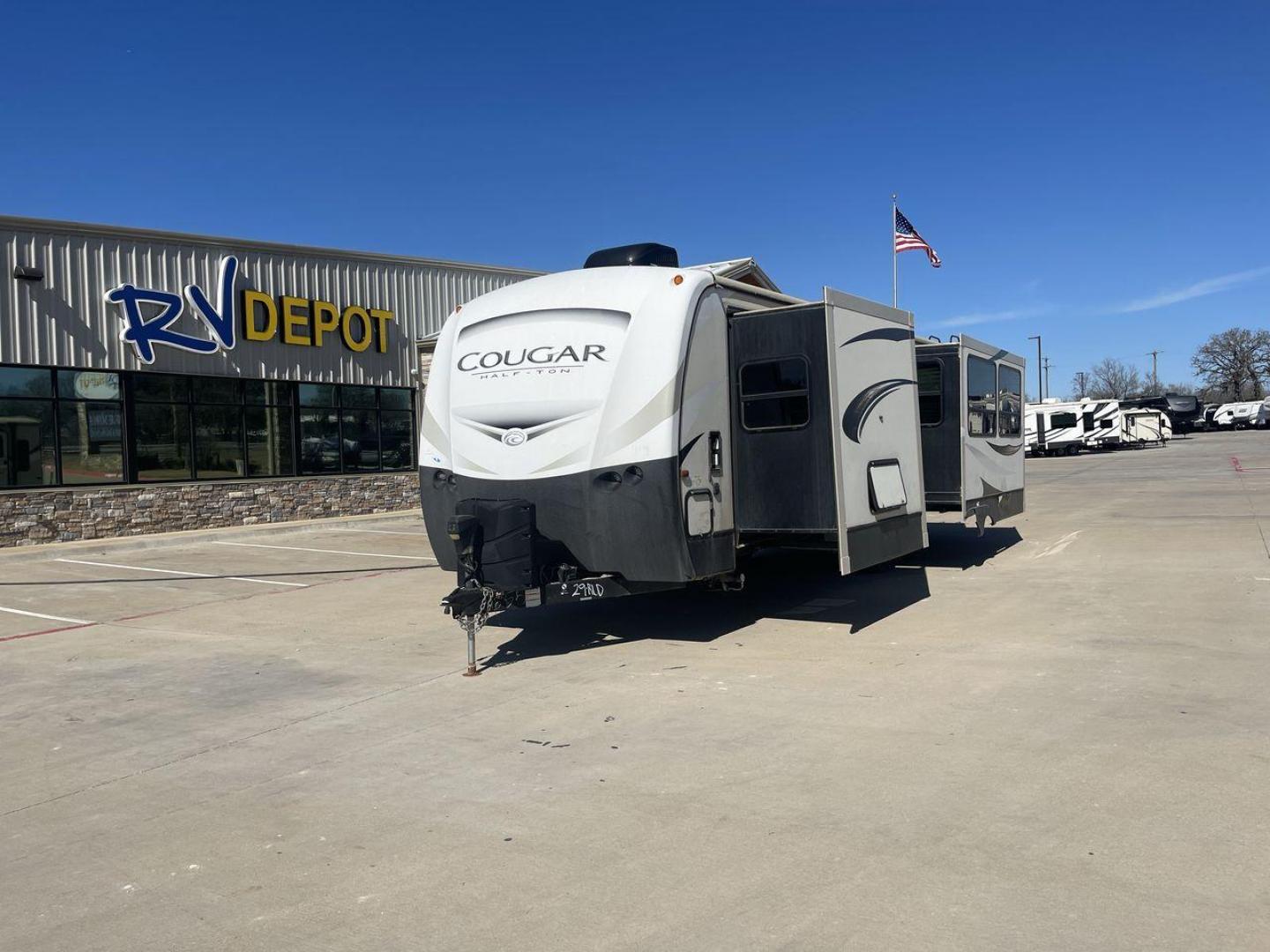 2019 TAN KEYSTONE COUGAR 29RLD (4YDT29R29JV) , Length: 34 ft. | Dry Weight: 7,380 lbs. | Gross Weight: 9,560 lbs. | Slides: 2 transmission, located at 4319 N Main St, Cleburne, TX, 76033, (817) 678-5133, 32.385960, -97.391212 - Photo#0