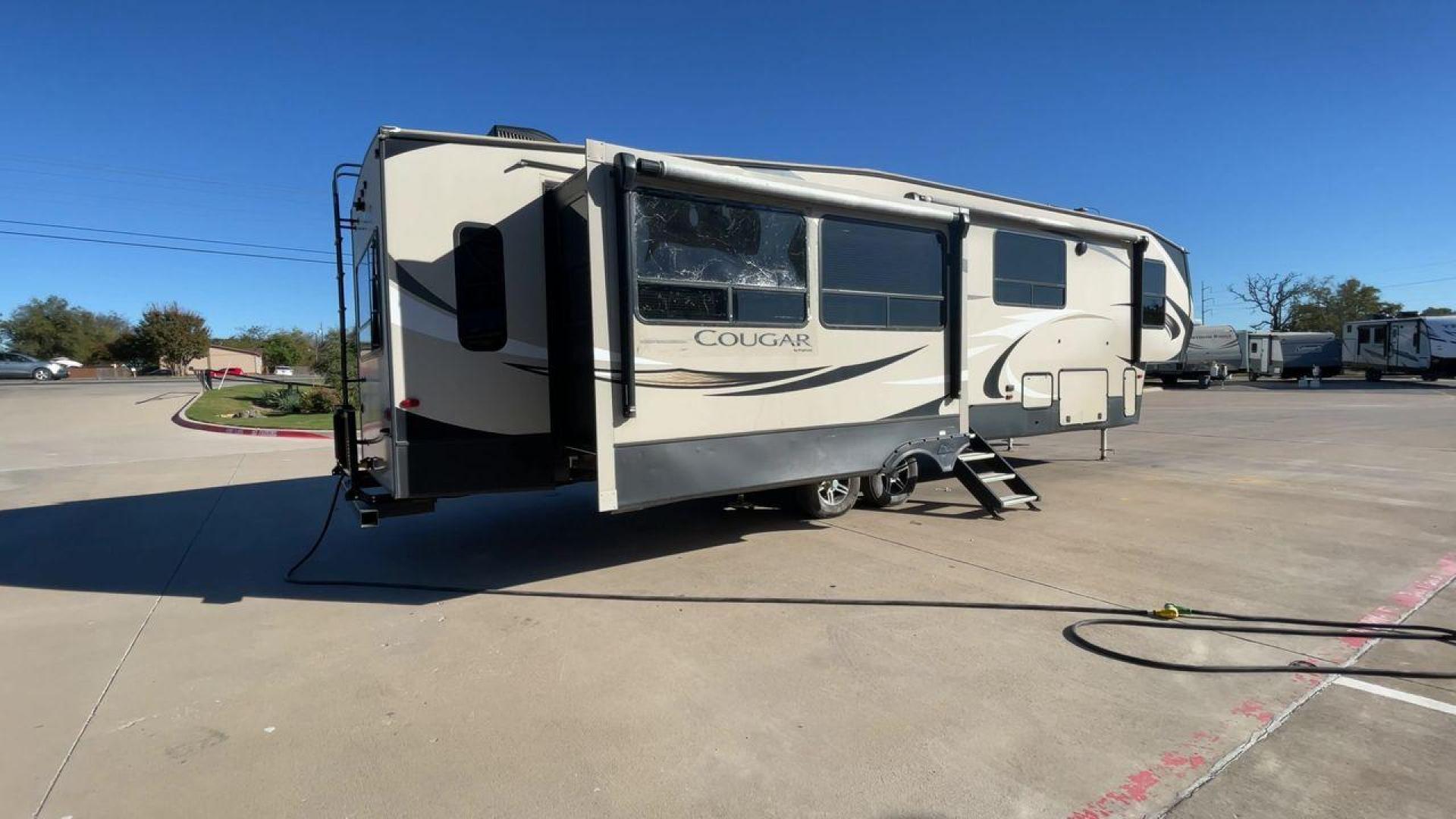 2019 KEYSTONE COUGAR 368MBI (4YDF3682XK2) , Length: 40.08 ft. | Dry Weight: 11,575 lbs. | Gross Weight: 13,980 lbs.| Slides: 4 transmission, located at 4319 N Main St, Cleburne, TX, 76033, (817) 678-5133, 32.385960, -97.391212 - Photo#1