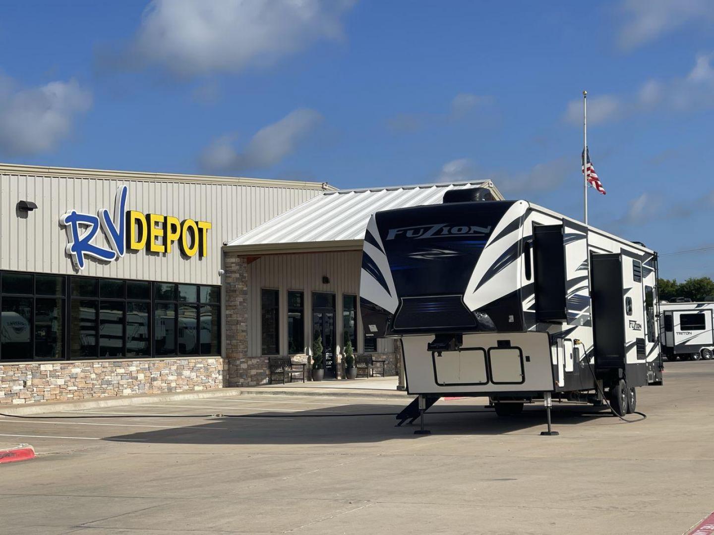 2019 KEYSTONE FUZION 373 (4YDF37322KF) , Length: 39 ft. | Dry Weight: 13,920 lbs. | Gross Weight: 17,000 lbs. | Slides: 3 transmission, located at 4319 N Main St, Cleburne, TX, 76033, (817) 678-5133, 32.385960, -97.391212 - The 2019 Keystone Fuzion 373 is an impressive 39-foot toy hauler designed for adventurous travelers. With a dry weight of 13,920 lbs and a gross weight of 17,000 lbs, this RV combines rugged capabilities with luxurious living spaces. Featuring three slides, the Fuzion 373 offers a spacious interior - Photo#0