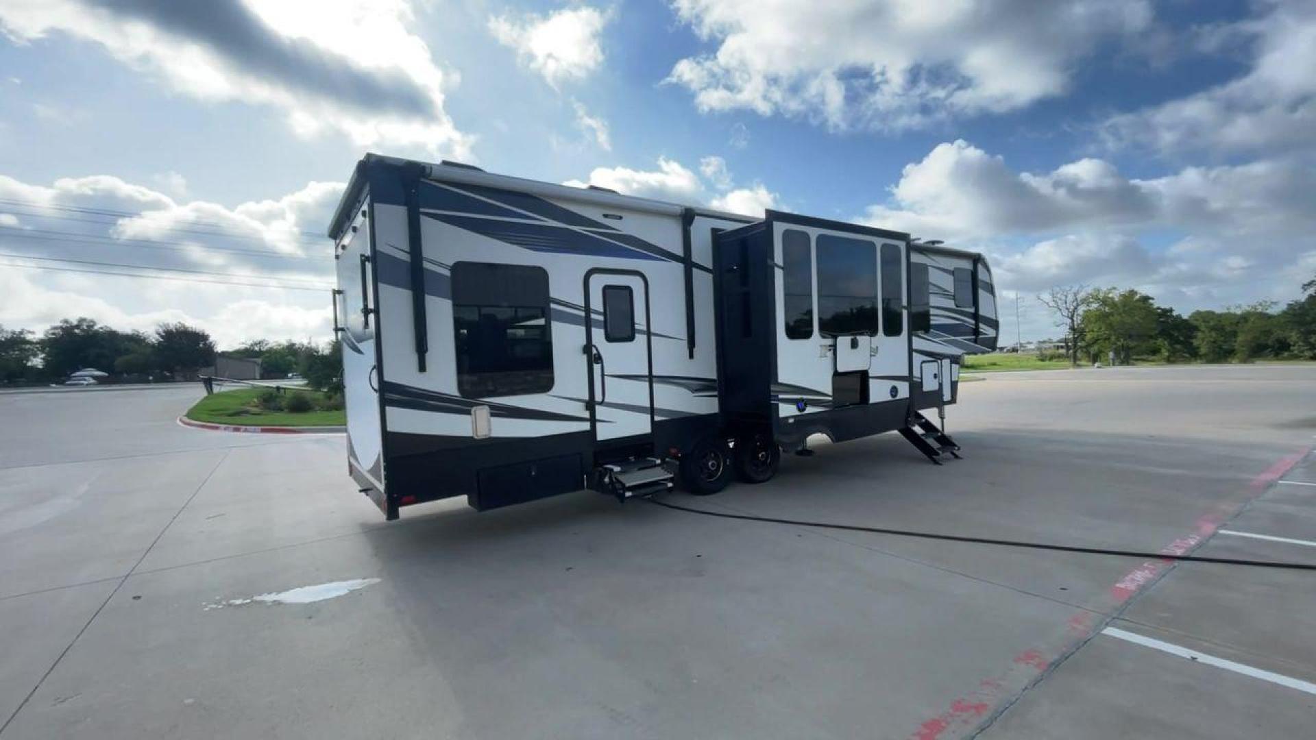 2019 KEYSTONE FUZION 373 (4YDF37322KF) , Length: 39 ft. | Dry Weight: 13,920 lbs. | Gross Weight: 17,000 lbs. | Slides: 3 transmission, located at 4319 N Main St, Cleburne, TX, 76033, (817) 678-5133, 32.385960, -97.391212 - The 2019 Keystone Fuzion 373 is an impressive 39-foot toy hauler designed for adventurous travelers. With a dry weight of 13,920 lbs and a gross weight of 17,000 lbs, this RV combines rugged capabilities with luxurious living spaces. Featuring three slides, the Fuzion 373 offers a spacious interior - Photo#1