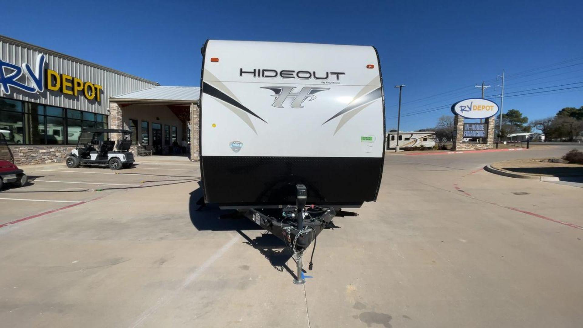 2019 KEYSTONE HIDEOUT 32BHTS (4YDT32F20K3) , Length: 37.67 ft. | Dry Weight: 8,634 lbs. | Gross Weight: 11,200 lbs. | Slides: 3 transmission, located at 4319 N Main St, Cleburne, TX, 76033, (817) 678-5133, 32.385960, -97.391212 - The 2019 Keystone Hideout 32BHTS is a spacious and family-friendly travel trailer, measuring 37 feet 7 inches in length, 8 feet in width, and 11 feet 4 inches in height, with a dry weight of 8,600 lbs and a GVWR of 11,200 lbs. Constructed with a cambered chassis and a full walk-on roof on a powder-c - Photo#4