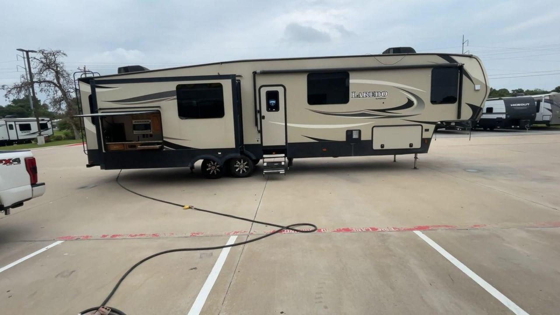 2019 KEYSTONE LAREDO 380MB (4YDF38023KE) , located at 4319 N Main St, Cleburne, TX, 76033, (817) 678-5133, 32.385960, -97.391212 - Photo#2