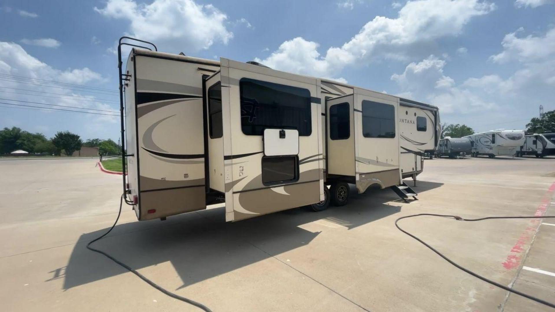 2019 KEYSTONE MONTANA 3701LK (4YDF3702XK4) , Length: 40.5 ft. | Dry Weight: 13,095 lbs. | Gross Weight: 16,400 lbs. | Slides: 4 transmission, located at 4319 N Main St, Cleburne, TX, 76033, (817) 678-5133, 32.385960, -97.391212 - Looking to camp in the lap of luxury and comfort? Go for this 2019 Keystone Montana 3701LK! This fifth wheel measures 40.5 ft. in length and 13.42 ft. in height. Not only is it spacious, but it also has plenty of headroom for tall campers! It also has a dry weight of 13,095 lbs. with a 3,305-poun - Photo#1