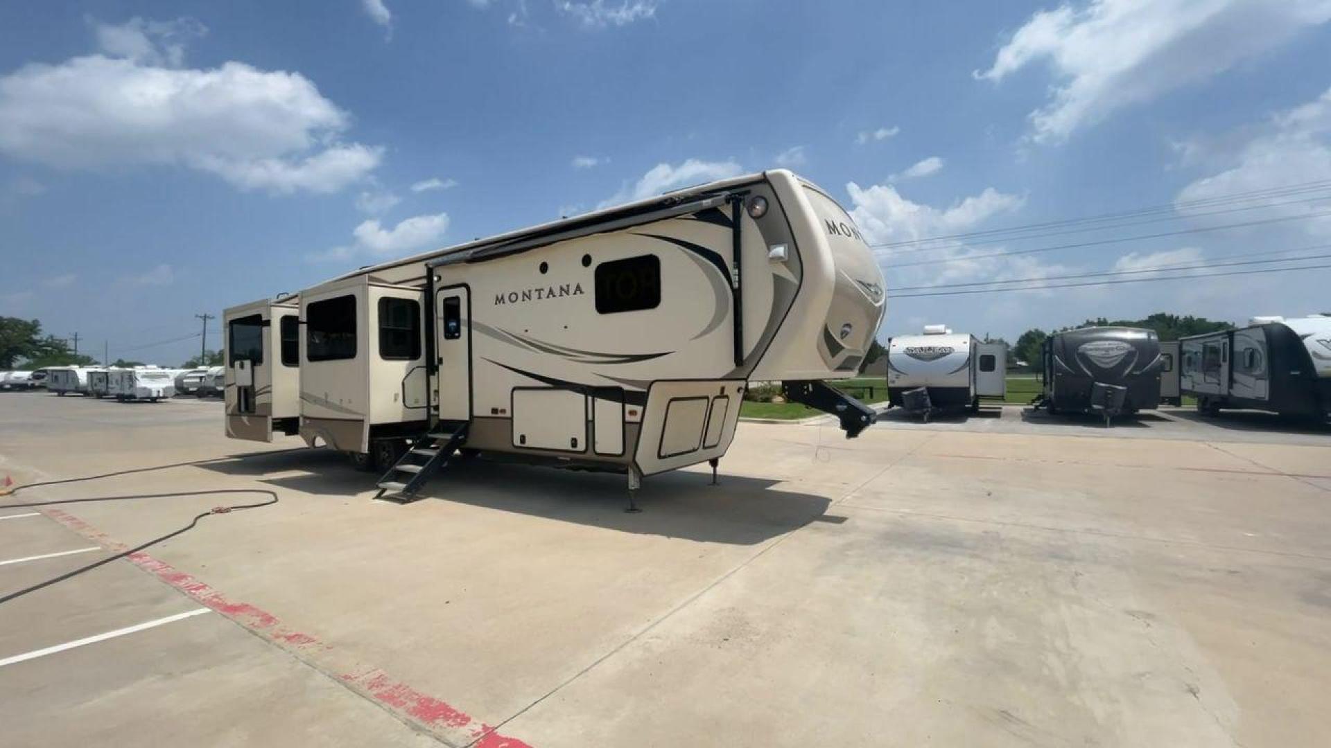 2019 KEYSTONE MONTANA 3701LK (4YDF3702XK4) , Length: 40.5 ft. | Dry Weight: 13,095 lbs. | Gross Weight: 16,400 lbs. | Slides: 4 transmission, located at 4319 N Main St, Cleburne, TX, 76033, (817) 678-5133, 32.385960, -97.391212 - Looking to camp in the lap of luxury and comfort? Go for this 2019 Keystone Montana 3701LK! This fifth wheel measures 40.5 ft. in length and 13.42 ft. in height. Not only is it spacious, but it also has plenty of headroom for tall campers! It also has a dry weight of 13,095 lbs. with a 3,305-poun - Photo#3