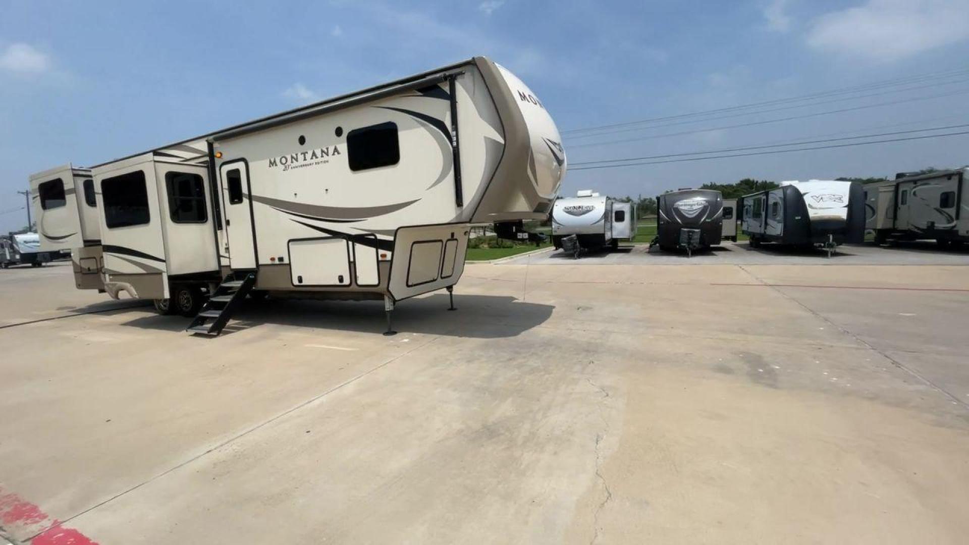 2019 KEYSTONE MONTANA 3791RD (4YDF37924K4) , Length: 40.42 ft. | Dry Weight: 13,900 lbs. | Gross Weight: 16,800 lbs. | Slides: 5 transmission, located at 4319 N Main St, Cleburne, TX, 76033, (817) 678-5133, 32.385960, -97.391212 - The 2019 Keystone Montana 3791RD is a luxurious and expansive fifth-wheel travel trailer designed to deliver the ultimate comfort and convenience. With an impressive length of 40.42 feet and equipped with five slides, this unit offers a huge living space that makes every journey feel like a stay in - Photo#3