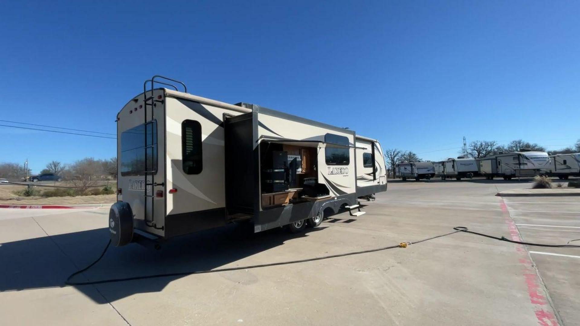 2019 KEYSTONE RV LAREDO 330RL (4YDT33027KB) , located at 4319 N Main St, Cleburne, TX, 76033, (817) 678-5133, 32.385960, -97.391212 - Photo#1