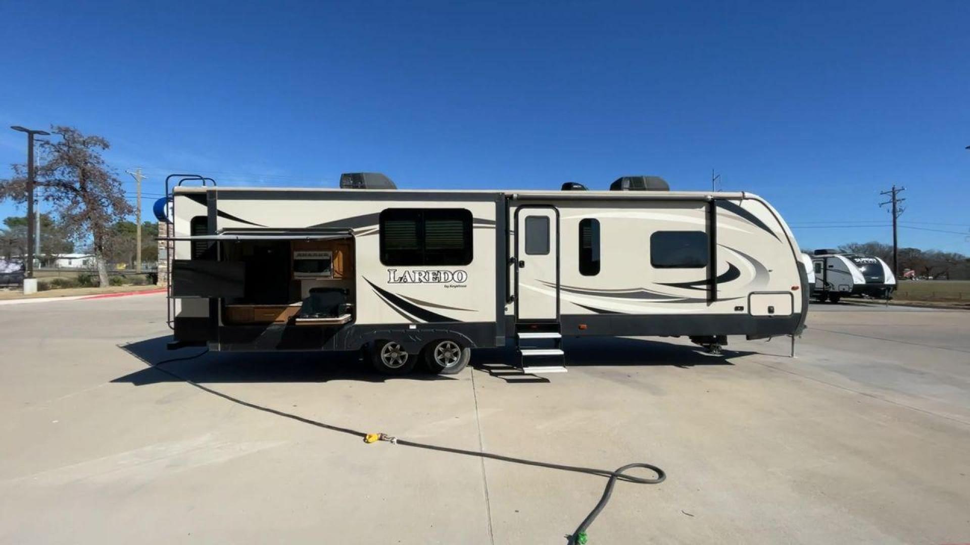 2019 KEYSTONE RV LAREDO 330RL (4YDT33027KB) , located at 4319 N Main St, Cleburne, TX, 76033, (817) 678-5133, 32.385960, -97.391212 - Photo#2