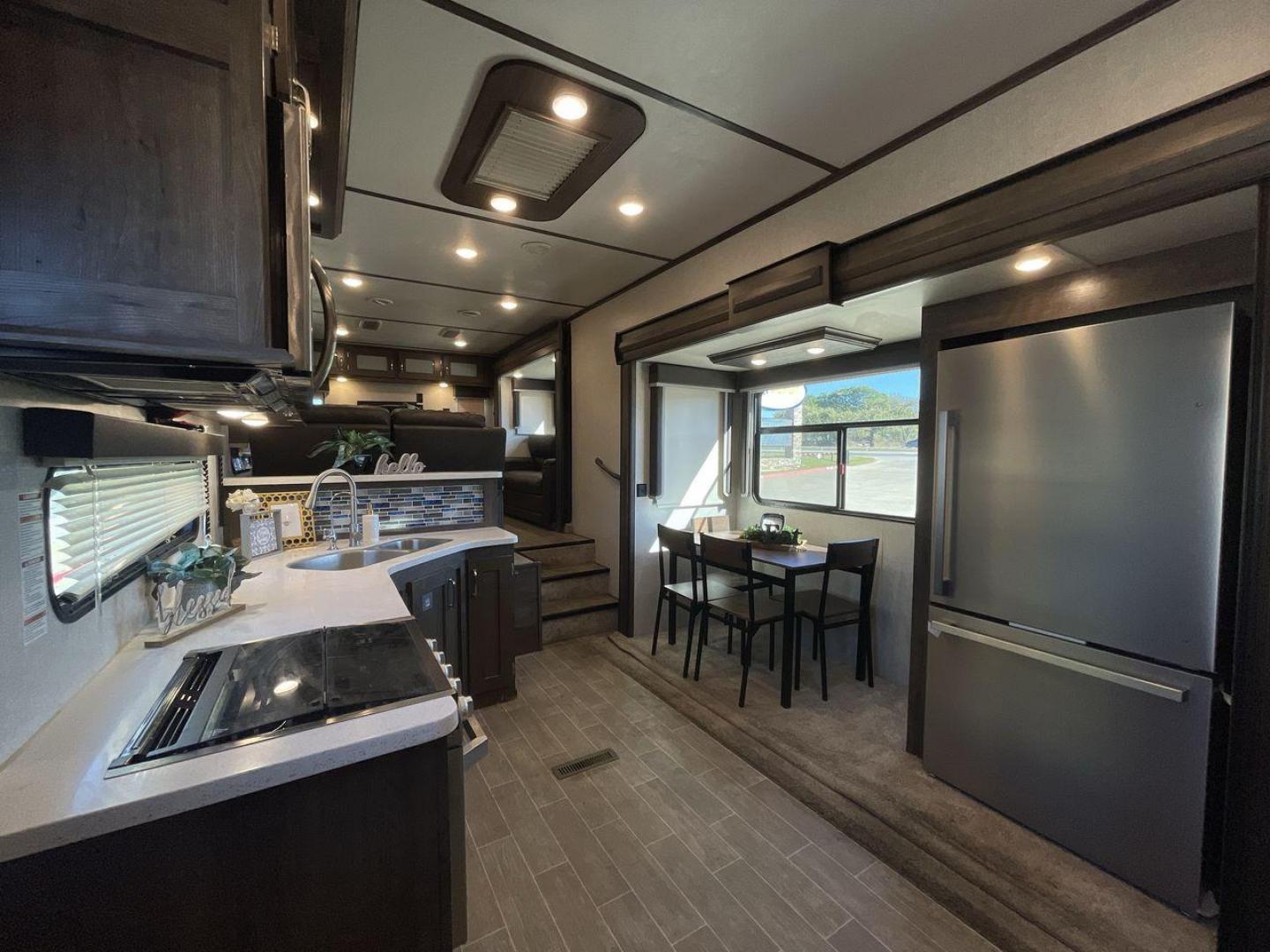 2019 KEYSTONE RV MONTANA 373RD (4YDF37323KA) , Length: 41.33 ft. | Dry Weight: 12,800 lbs. | Gross Weight: 16,000 lbs. | Slides: 4 transmission, located at 4319 N Main St, Cleburne, TX, 76033, (817) 678-5133, 32.385960, -97.391212 - The 2019 Keystone RV Montana 373RD is a luxurious and spacious fifth wheel designed to provide the utmost comfort, convenience, and style for your next adventure. Right up front, this trailer is a painted cap with LED lights. The massive power awning on its side has a LED strip and rolls out with a - Photo#9