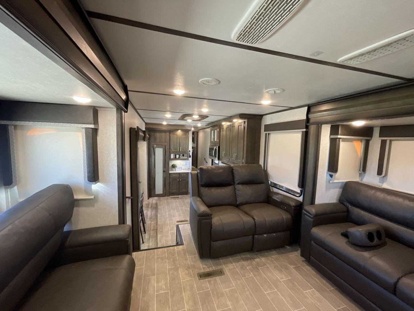 2019 KEYSTONE RV MONTANA 373RD (4YDF37323KA) , Length: 41.33 ft. | Dry Weight: 12,800 lbs. | Gross Weight: 16,000 lbs. | Slides: 4 transmission, located at 4319 N Main St, Cleburne, TX, 76033, (817) 678-5133, 32.385960, -97.391212 - The 2019 Keystone RV Montana 373RD is a luxurious and spacious fifth wheel designed to provide the utmost comfort, convenience, and style for your next adventure. Right up front, this trailer is a painted cap with LED lights. The massive power awning on its side has a LED strip and rolls out with a - Photo#11