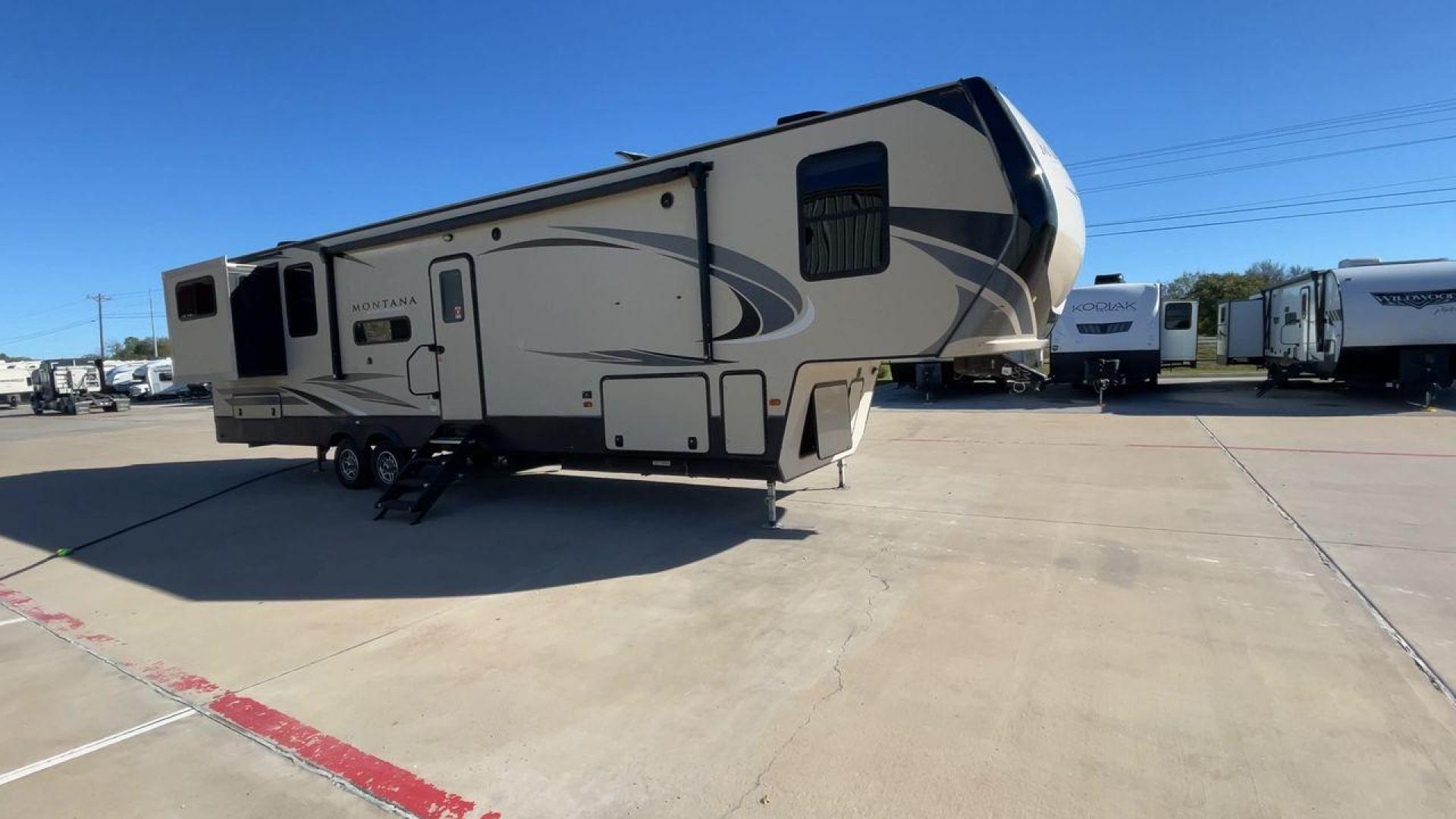 2019 KEYSTONE RV MONTANA 373RD (4YDF37323KA) , Length: 41.33 ft. | Dry Weight: 12,800 lbs. | Gross Weight: 16,000 lbs. | Slides: 4 transmission, located at 4319 N Main St, Cleburne, TX, 76033, (817) 678-5133, 32.385960, -97.391212 - The 2019 Keystone RV Montana 373RD is a luxurious and spacious fifth wheel designed to provide the utmost comfort, convenience, and style for your next adventure. Right up front, this trailer is a painted cap with LED lights. The massive power awning on its side has a LED strip and rolls out with a - Photo#3