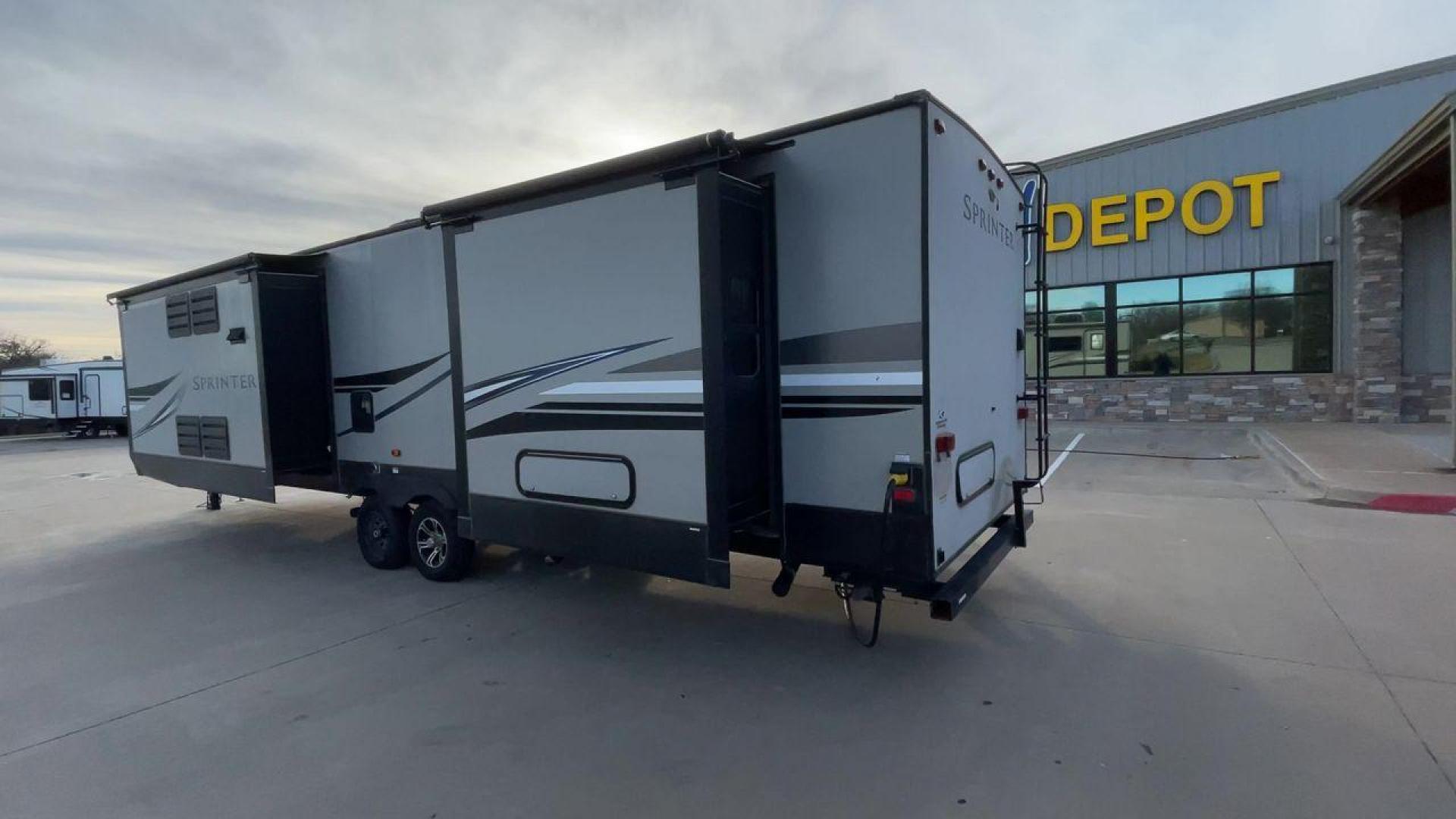 2019 KEYSTONE SPRINTER 330KBS (4YDT33021K1) , Length: 37.75 ft. | Dry Weight: 9,100 lbs. | Gross Weight: 11,500 lbs. | Slides: 3 transmission, located at 4319 N Main St, Cleburne, TX, 76033, (817) 678-5133, 32.385960, -97.391212 - The 2019 Keystone Sprinter 330KBS travel trailer is a spacious and well-designed unit, measuring 37.75 feet in length. The exterior is sleek and modern, featuring a gray and white color scheme accented by black and blue graphic lines. The trailer has three (3) slideouts, providing ample space for c - Photo#7