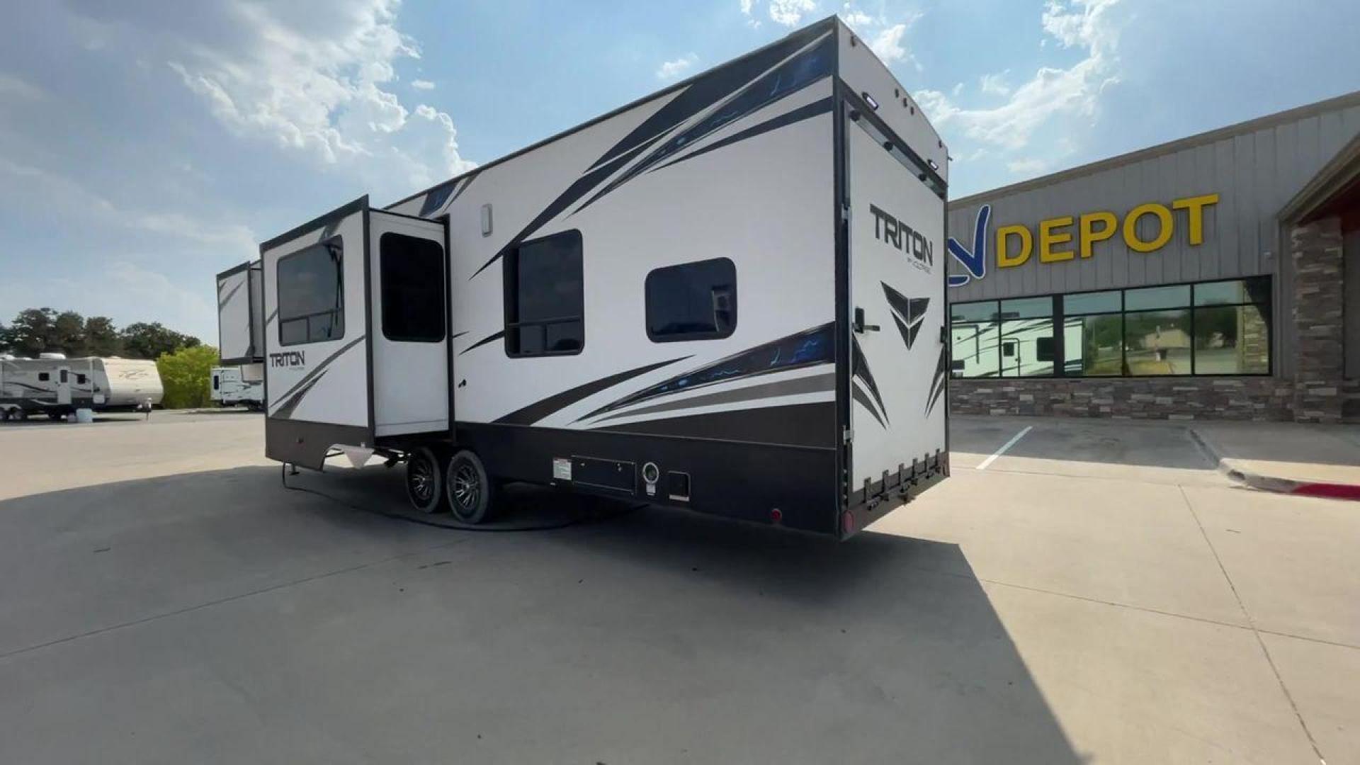 2019 TRITON VOLTAGE 3561 (4YDF3562XKZ) , Length: 38.83 ft. | Dry Weight: 11,826 lbs. | Slides: 2 transmission, located at 4319 N Main St, Cleburne, TX, 76033, (817) 678-5133, 32.385960, -97.391212 - The stunning toy hauler 2019 Keystone Voltage 3561 is made for adventure lovers. It combines the simplicity of transporting and enjoying your preferred recreational vehicles with the comfort of a contemporary house. This toy hauler provides an entertaining and comfortable base for your outdoor adven - Photo#7