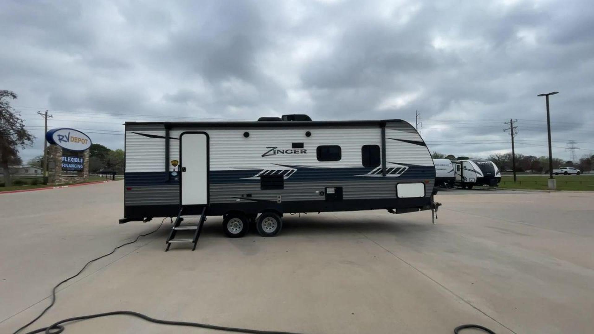 2019 KEYSTONE ZINGER 254RB (4YDT25426KS) , Length: 29.5 ft | Dry Weight: 6,042 lbs| Slides: 1 transmission, located at 4319 N Main St, Cleburne, TX, 76033, (817) 678-5133, 32.385960, -97.391212 - Take a trip of comfort and excitement in the 2019 Keystone Zinger 254RB travel trailer, which was carefully made to change the way you use an RV. This type, which is 29.5 feet long, is the perfect mix of functionality and style. The Zinger 254RB is built to last with a strong metal body and fibergla - Photo#2