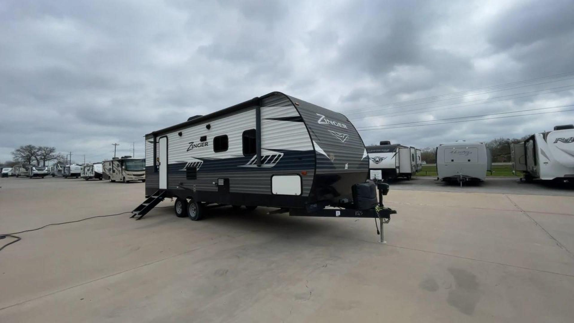 2019 KEYSTONE ZINGER 254RB (4YDT25426KS) , Length: 29.5 ft | Dry Weight: 6,042 lbs| Slides: 1 transmission, located at 4319 N Main St, Cleburne, TX, 76033, (817) 678-5133, 32.385960, -97.391212 - Take a trip of comfort and excitement in the 2019 Keystone Zinger 254RB travel trailer, which was carefully made to change the way you use an RV. This type, which is 29.5 feet long, is the perfect mix of functionality and style. The Zinger 254RB is built to last with a strong metal body and fibergla - Photo#3