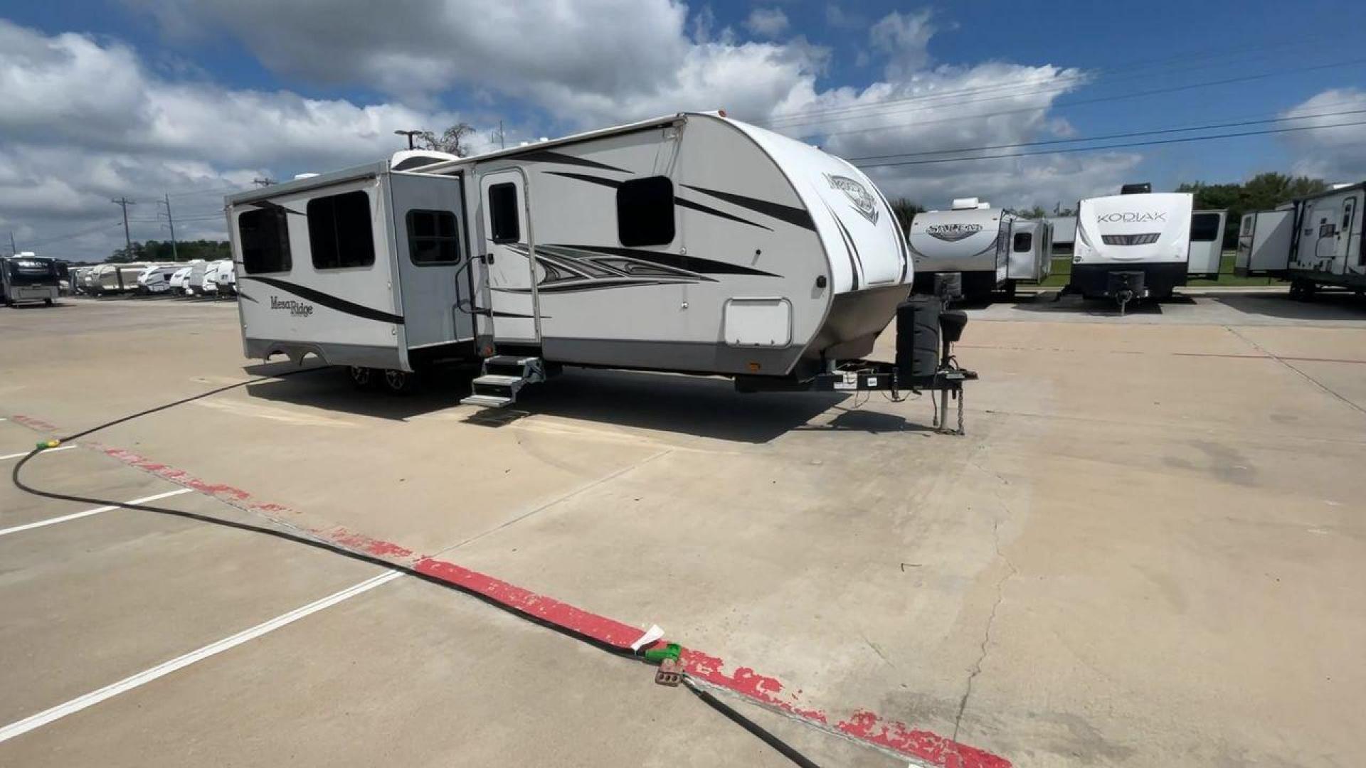 2019 GRAY OPEN RANGE MESA RIDGE (58TBH0BT1K3) , Length: 36.9 ft. | Dry Weight: 7,745 lbs. | Gross Weight: 9,735 lbs. | Slides: 3 transmission, located at 4319 N Main St, Cleburne, TX, 76033, (817) 678-5133, 32.385960, -97.391212 - The 2019 Open Range Mesa Ridge 312BHS is a premium travel trailer that combines spaciousness, luxury, and practicality, making it ideal for families or groups looking for comfort on the road. This bunkhouse model has a large, open floor plan, providing separate living, sleeping, and outdoor areas. T - Photo#3