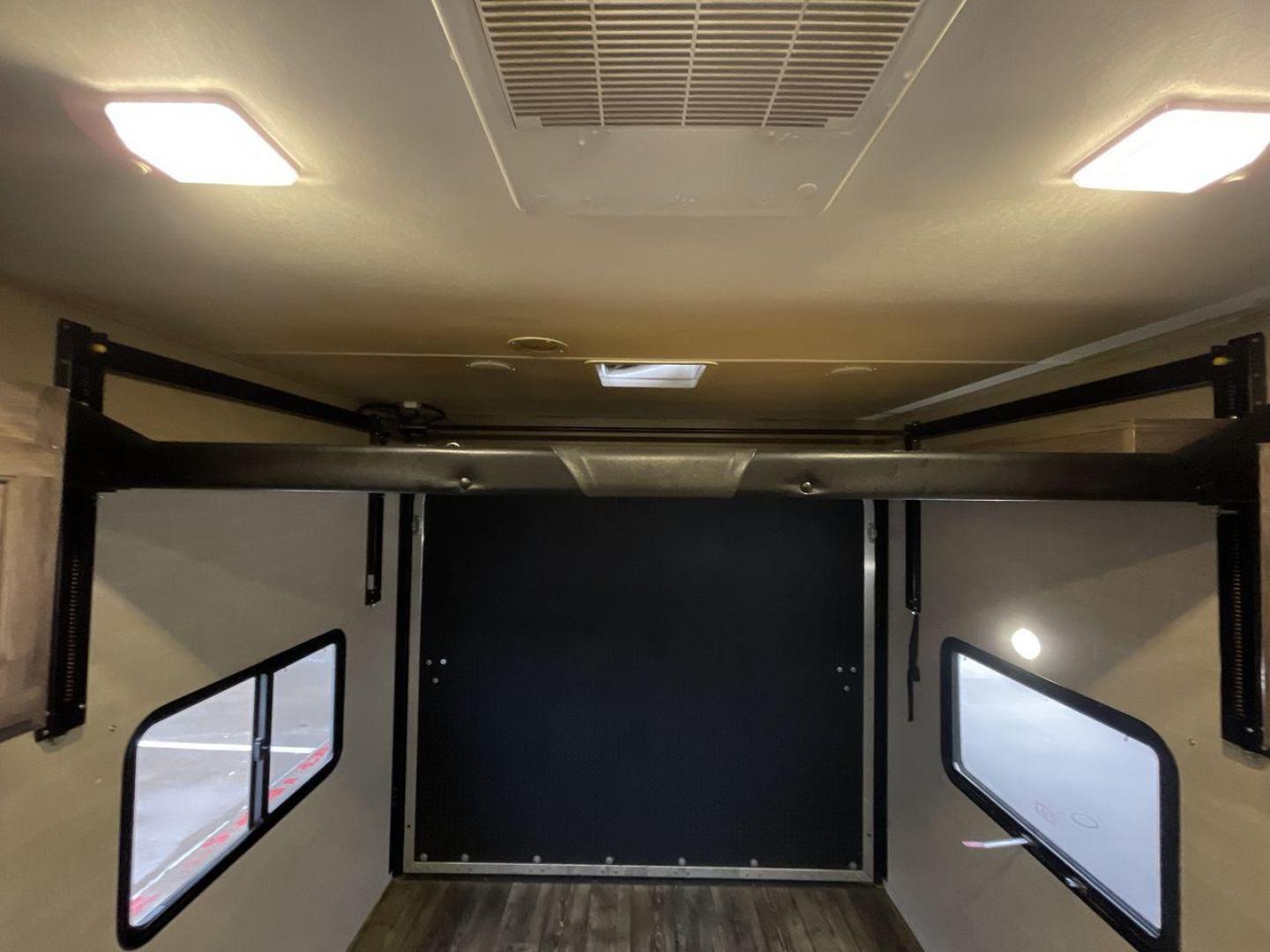 2019 PACIFIC COACHWORKS SANDSPORT 22EX (5UYCN2222KR) , Length: 27 ft. | Dry Weight: 5,478 lbs. | Gross Weight: 9,000 lbs. | Slides: 0 transmission, located at 4319 N Main St, Cleburne, TX, 76033, (817) 678-5133, 32.385960, -97.391212 - If you're looking for a cute and compact camper for your next adventure, check out this 2019 Pacific Coachworks Sandsport 22EX! This 27-foot-long toy hauler travel trailer has a dry weight of 5,478 pounds. It has a manageable hitch weight of 633 pounds and a GVWR of 9,000 pounds. It offers about - Photo#16