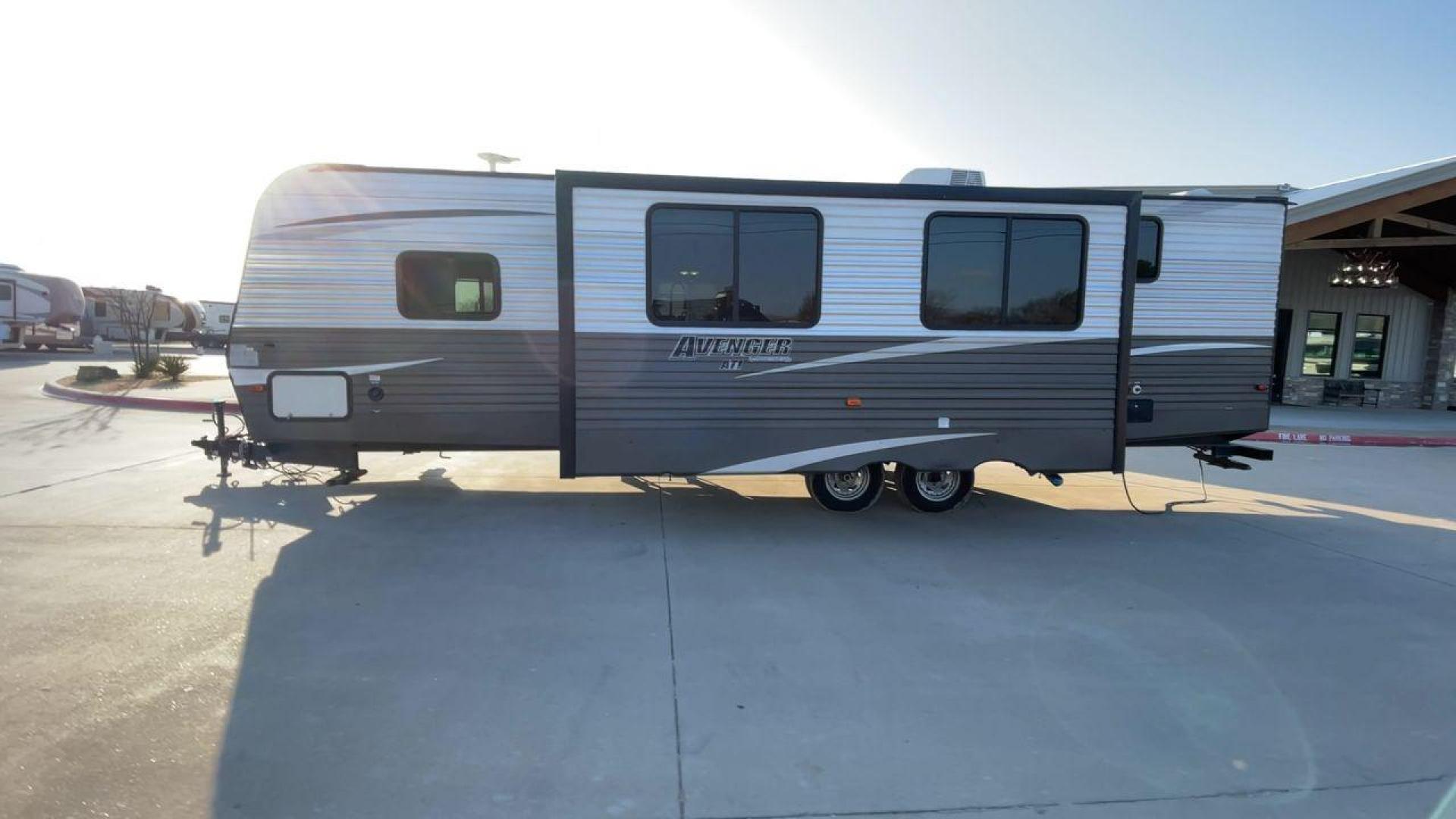 2019 TAN PRIMETIME AVENGER 27RBS (5ZT2AVSB2JB) , Length: 33.5 ft. | Dry Weight: 6,663 lbs. | Slides: 1 transmission, located at 4319 N Main St, Cleburne, TX, 76033, (817) 678-5133, 32.385960, -97.391212 - This 2019 Prime Time Avenger 27RBS measures 33.5 feet long. It has a dry weight of 6,663 lbs. and a payload capacity of 2,902 lbs. It also has a manageable hitch weight of 765 lbs. Additionally, it features one slide and one 16-foot awning. The unit is designed with a front private bedroom, a centra - Photo#6