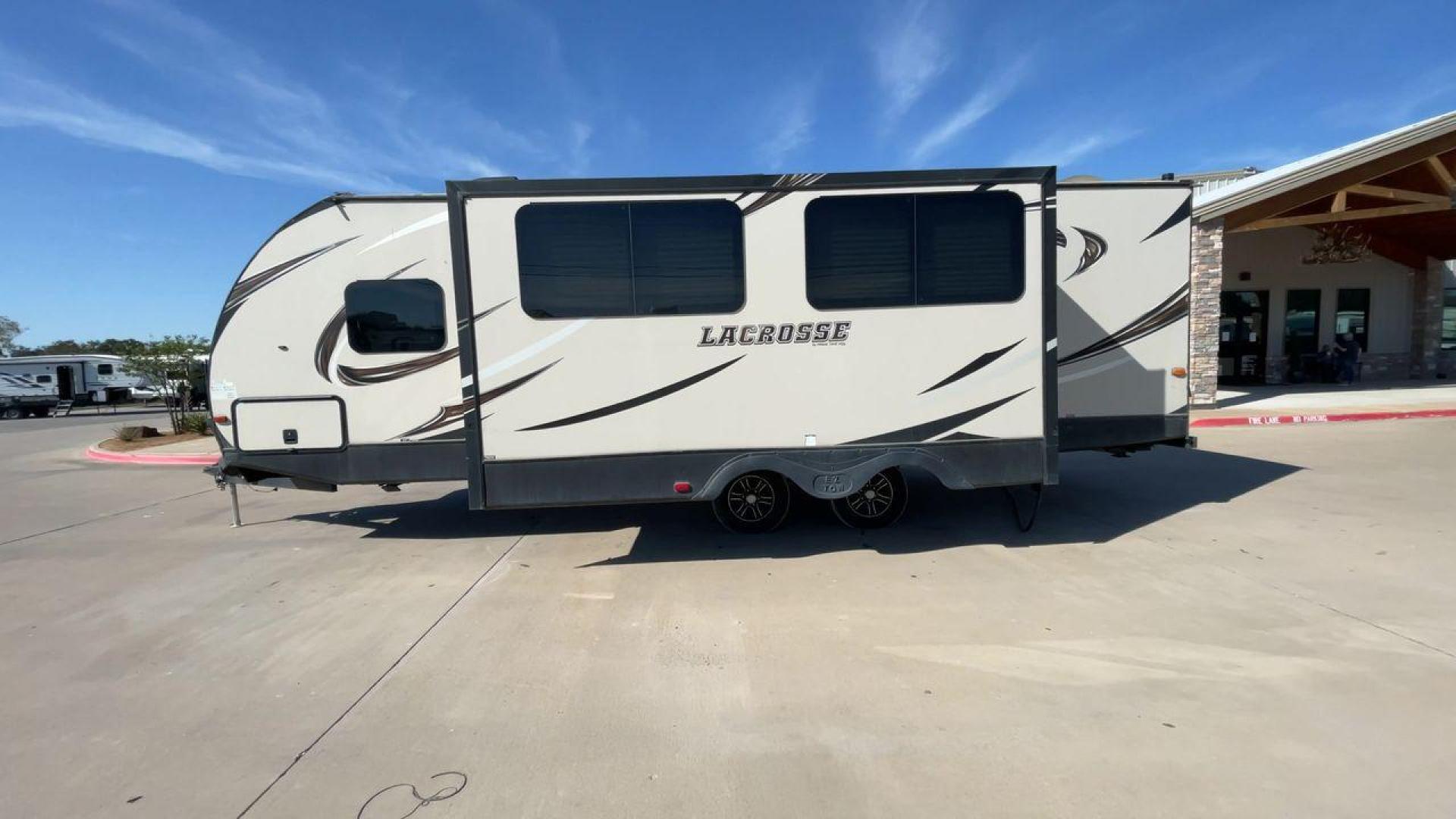 2019 TAN PRIME TIME LACROSSE 2911RB - (5ZT2LCUB3KB) , Length: 31.92 ft. | Dry Weight: 6,516 lbs. | Slides: 1 transmission, located at 4319 N Main St, Cleburne, TX, 76033, (817) 678-5133, 32.385960, -97.391212 - This 2019 LaCrosse 2911RB travel trailer measures just a bit under 32' in length. It is a dual axle, aluminum wheel setup with a dry weight of 6,516 lbs and has a carrying capacity of 3,054 lbs. This LaCrosse has one slide. The rear of the trailer holds the bathroom, which has a standalone sink a - Photo#6