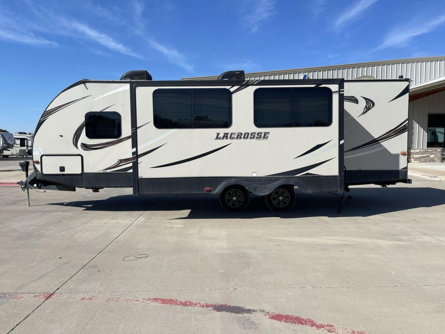 2019 TAN PRIME TIME LACROSSE 2911RB - (5ZT2LCUB3KB) , Length: 31.92 ft. | Dry Weight: 6,516 lbs. | Slides: 1 transmission, located at 4319 N Main St, Cleburne, TX, 76033, (817) 678-5133, 32.385960, -97.391212 - This 2019 LaCrosse 2911RB travel trailer measures just a bit under 32' in length. It is a dual axle, aluminum wheel setup with a dry weight of 6,516 lbs and has a carrying capacity of 3,054 lbs. This LaCrosse has one slide. The rear of the trailer holds the bathroom, which has a standalone sink a - Photo#24