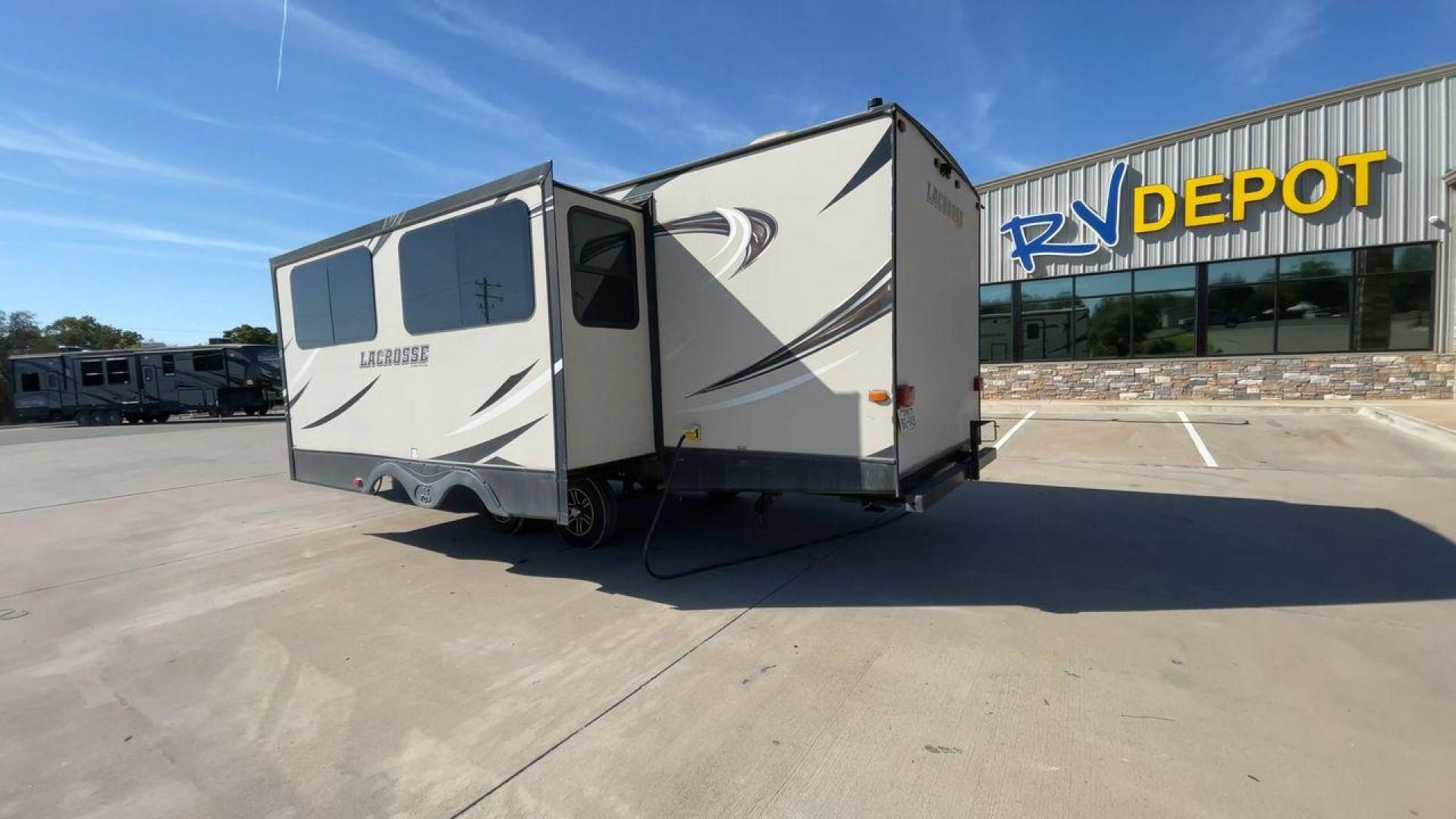 2019 TAN PRIME TIME LACROSSE 2911RB - (5ZT2LCUB3KB) , Length: 31.92 ft. | Dry Weight: 6,516 lbs. | Slides: 1 transmission, located at 4319 N Main St, Cleburne, TX, 76033, (817) 678-5133, 32.385960, -97.391212 - This 2019 LaCrosse 2911RB travel trailer measures just a bit under 32' in length. It is a dual axle, aluminum wheel setup with a dry weight of 6,516 lbs and has a carrying capacity of 3,054 lbs. This LaCrosse has one slide. The rear of the trailer holds the bathroom, which has a standalone sink and - Photo#7