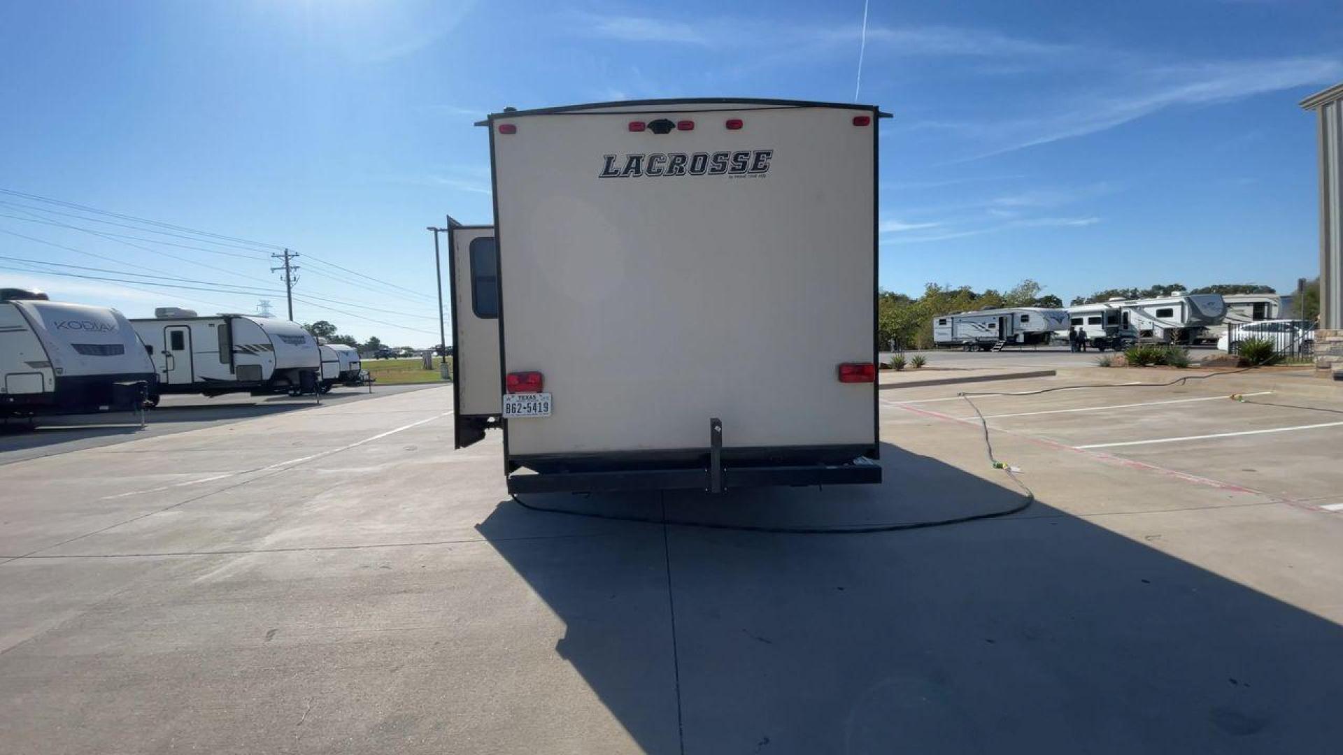 2019 TAN PRIME TIME LACROSSE 2911RB - (5ZT2LCUB3KB) , Length: 31.92 ft. | Dry Weight: 6,516 lbs. | Slides: 1 transmission, located at 4319 N Main St, Cleburne, TX, 76033, (817) 678-5133, 32.385960, -97.391212 - This 2019 LaCrosse 2911RB travel trailer measures just a bit under 32' in length. It is a dual axle, aluminum wheel setup with a dry weight of 6,516 lbs and has a carrying capacity of 3,054 lbs. This LaCrosse has one slide. The rear of the trailer holds the bathroom, which has a standalone sink and - Photo#8