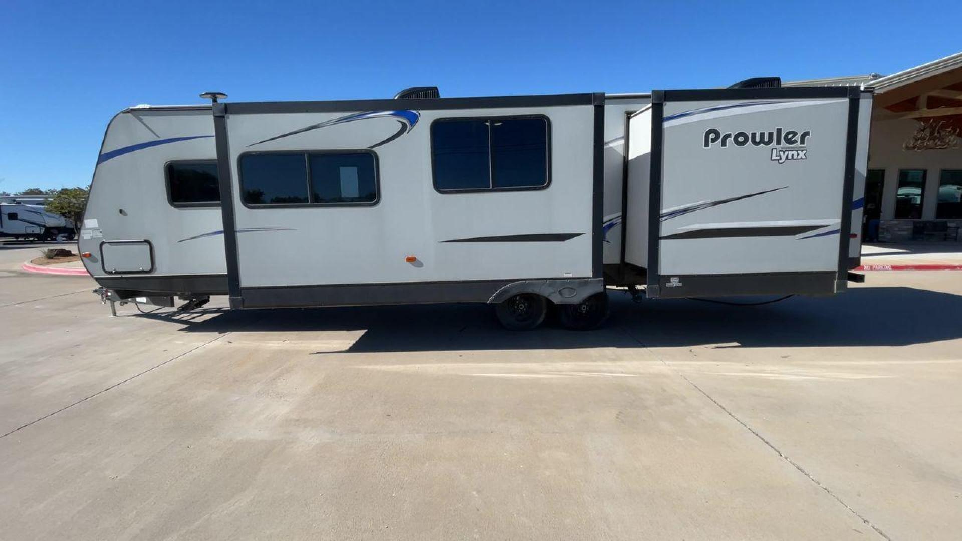 2019 GRAY PROWLER 32LX - (5SFPB3626KE) , Length: 36.33 ft. | Dry Weight: 7,540 lbs. | Slides: 2 transmission, located at 4319 N Main St, Cleburne, TX, 76033, (817) 678-5133, 32.385960, -97.391212 - This 2019 Prowler 32LX is a dual-axle steel wheel setup measuring 36.33 ft. in length and 11.17 ft. in height. It has a dry weight of 7,540 lbs. and a hitch weight of 940 lbs. It features two doors, two slides, and one awning. This travel trailer is a bunkhouse model that can sleep up to 11 peopl - Photo#6