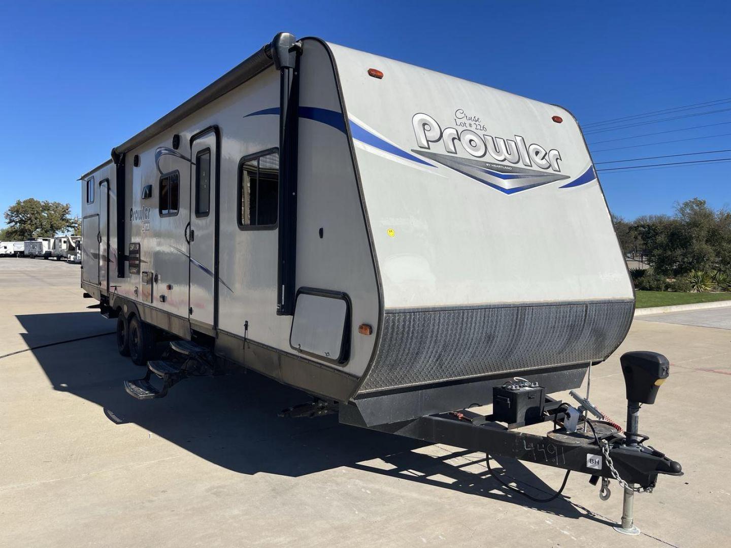 2019 GRAY PROWLER 32LX - (5SFPB3626KE) , Length: 36.33 ft. | Dry Weight: 7,540 lbs. | Slides: 2 transmission, located at 4319 N Main St, Cleburne, TX, 76033, (817) 678-5133, 32.385960, -97.391212 - This 2019 Prowler 32LX is a dual-axle steel wheel setup measuring 36.33 ft. in length and 11.17 ft. in height. It has a dry weight of 7,540 lbs. and a hitch weight of 940 lbs. It features two doors, and two slides. This travel trailer is a bunkhouse model that can sleep up to 11 people. The bunkhous - Photo#23