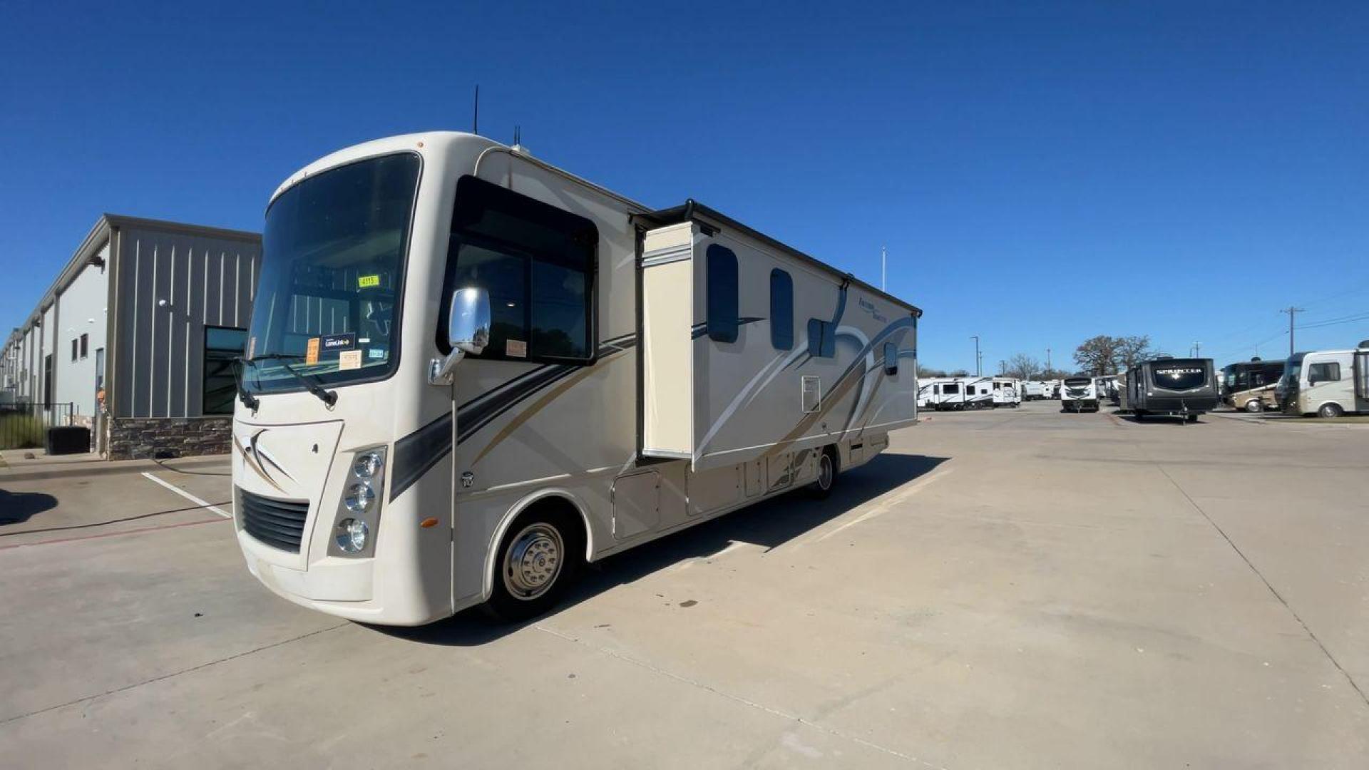 2019 THOR FREEDOM TRAVELER A30 (1F65F5DY1K0) , Length:31.75 ft. | Gross Weight: 18,000 lbs. | Slides: 1 transmission, located at 4319 N Main St, Cleburne, TX, 76033, (817) 678-5133, 32.385960, -97.391212 - The 2019 Thor Freedom Traveler A30 is a sleek and modern travel trailer with an attractive beige exterior enhanced by dynamic swirls of gold, black, and white accents. Its single slide-out provides extra interior space when parked. The coach features large, tinted windows for ample natural light whi - Photo#5