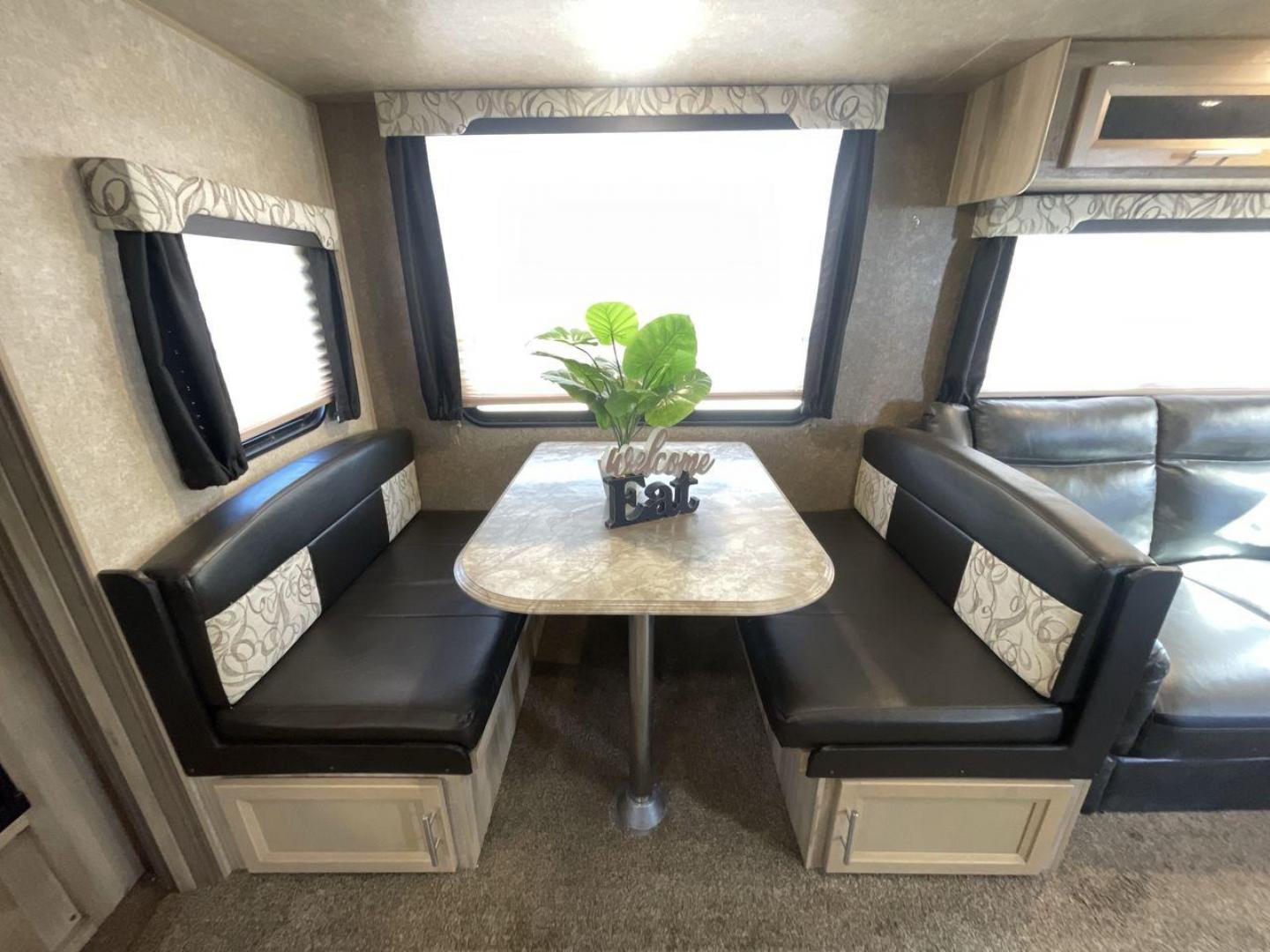 2020 COACHMEN CATALINA 303RKPLE (5ZT2CAVB4LX) , Length: 35.25 ft. | Dry Weight: 7,746 lbs. | Gross Weight: 9,800 lbs. | Slides: 1 transmission, located at 4319 N Main St, Cleburne, TX, 76033, (817) 678-5133, 32.385960, -97.391212 - The 2020 Coachmen Catalina Legacy Edition is a spacious RV with a length of 35.25 feet. Its exteriors feature sleek, silver aluminum siding with blue and black accent decals. The RV has one large slideout that extends the living area. The front of the RV has a rounded nose with a dark rock guard pan - Photo#14