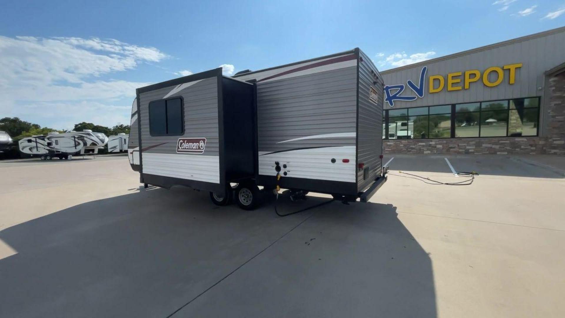 2020 DUTCHMEN COLEMAN 244BH (4YDT24426LH) , Length: 27.58 ft. | Dry Weight: 5,541 lbs. | Slides: 1 transmission, located at 4319 N Main St, Cleburne, TX, 76033, (817) 678-5133, 32.385960, -97.391212 - The 2020 Dutchmen Coleman 244BH travel trailer offers a sleek and sturdy exterior design, making it perfect for both seasoned travelers and families seeking adventure. The front of the trailer features the iconic Coleman logo prominently displayed on its silver and white aluminum exterior. At 27.58 - Photo#6