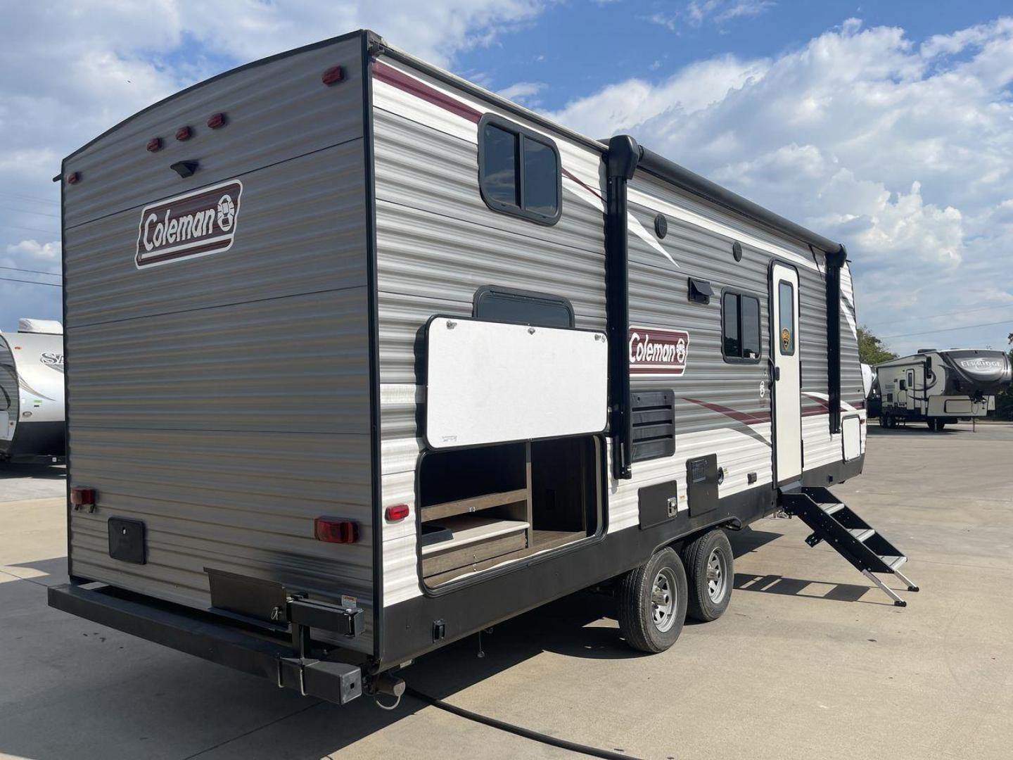 2020 DUTCHMEN COLEMAN 244BH (4YDT24426LH) , Length: 27.58 ft. | Dry Weight: 5,541 lbs. | Slides: 1 transmission, located at 4319 N Main St, Cleburne, TX, 76033, (817) 678-5133, 32.385960, -97.391212 - The 2020 Dutchmen Coleman 244BH travel trailer offers a sleek and sturdy exterior design, making it perfect for both seasoned travelers and families seeking adventure. The front of the trailer features the iconic Coleman logo prominently displayed on its silver and white aluminum exterior. At 27.58 - Photo#24