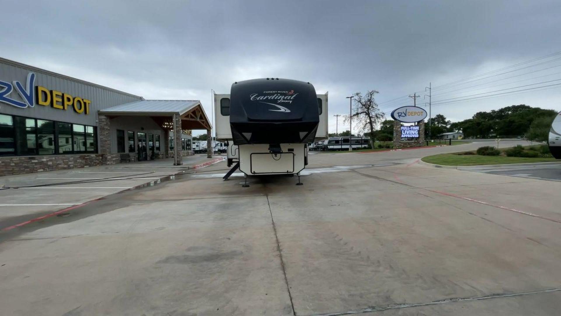 2020 FOREST RIVER CARDINAL 3700FLX (4X4FCAN21LG) , Length: 41.8 ft | Dry Weight: 13,516 lbs | Gross Weight: 16,550 lbs | Slides: 5 transmission, located at 4319 N Main St, Cleburne, TX, 76033, (817) 678-5133, 32.385960, -97.391212 - The 2020 Forest River Cardinal 3700FLX is the ultimate in luxury and comfort. It is a fifth-wheel RV that was intended to be both beautiful and useful. Its elegant front living area has premium theater seats, a fireplace, and a TV that can be pulled out of the wall, making it a great place to relax - Photo#4