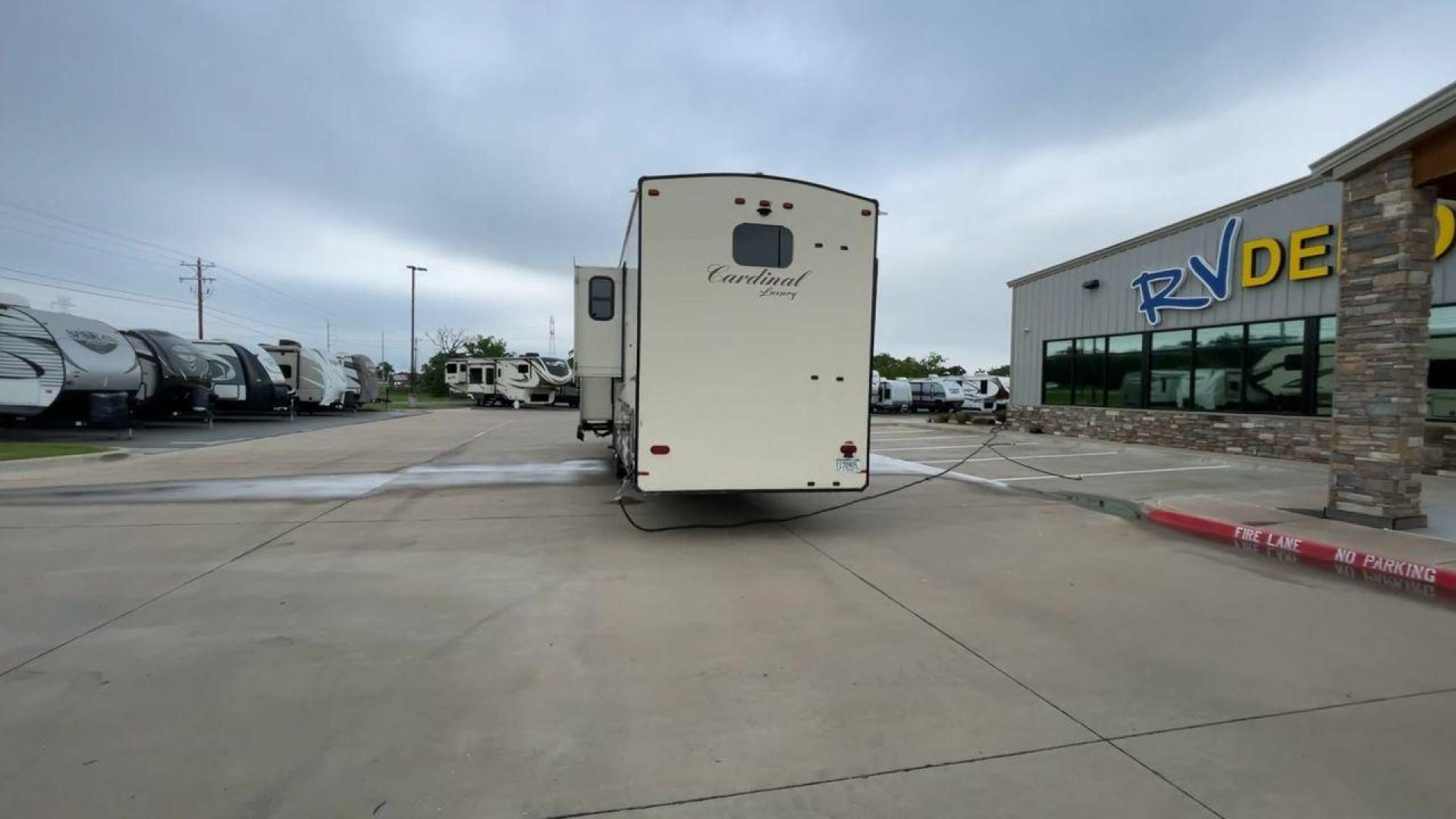 2020 FOREST RIVER CARDINAL 3700FLX (4X4FCAN21LG) , Length: 41.8 ft | Dry Weight: 13,516 lbs | Gross Weight: 16,550 lbs | Slides: 5 transmission, located at 4319 N Main St, Cleburne, TX, 76033, (817) 678-5133, 32.385960, -97.391212 - The 2020 Forest River Cardinal 3700FLX is the ultimate in luxury and comfort. It is a fifth-wheel RV that was intended to be both beautiful and useful. Its elegant front living area has premium theater seats, a fireplace, and a TV that can be pulled out of the wall, making it a great place to relax - Photo#8