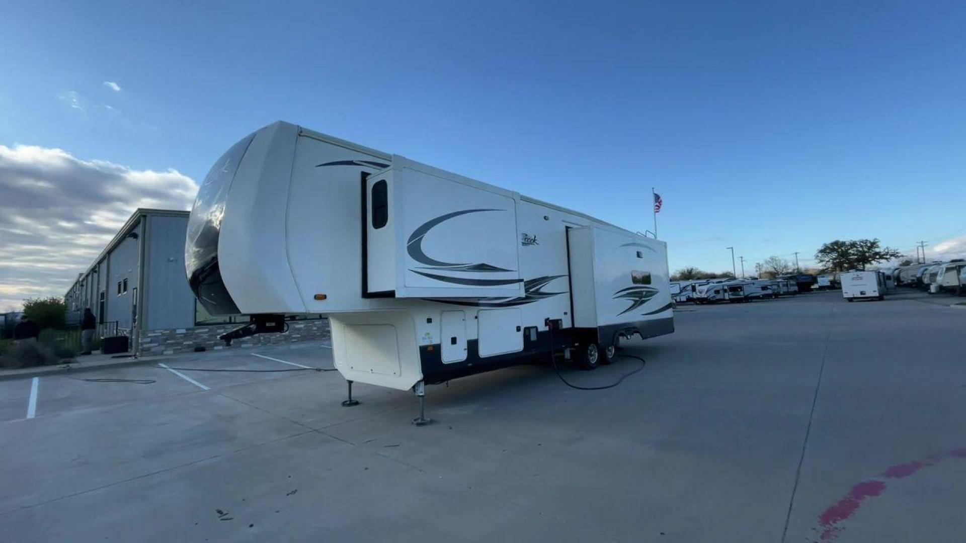 2020 TAN FOREST RIVER CEDAR CREEK HATHAWAY (4X4FCRM28LS) , Length: 38.83 ft. | Dry Weight: 13,134 lbs. | Gross Weight: 16,525 lbs. | Slides: 3 transmission, located at 4319 N Main St, Cleburne, TX, 76033, (817) 678-5133, 32.385960, -97.391212 - This 2020 Cedar Creek Hathaway 36CK2 fifth wheel has a length of 38.83 ft, a width of 8 ft, and a height of 13.42 ft. This fifth wheel has a dry weight of 13,134 lbs and a payload capacity of 3,391. The GVWR is 16,525 lbs and has a hitch weight of 2,525 lbs. The Cedar Creek has a true gel coat finis - Photo#5