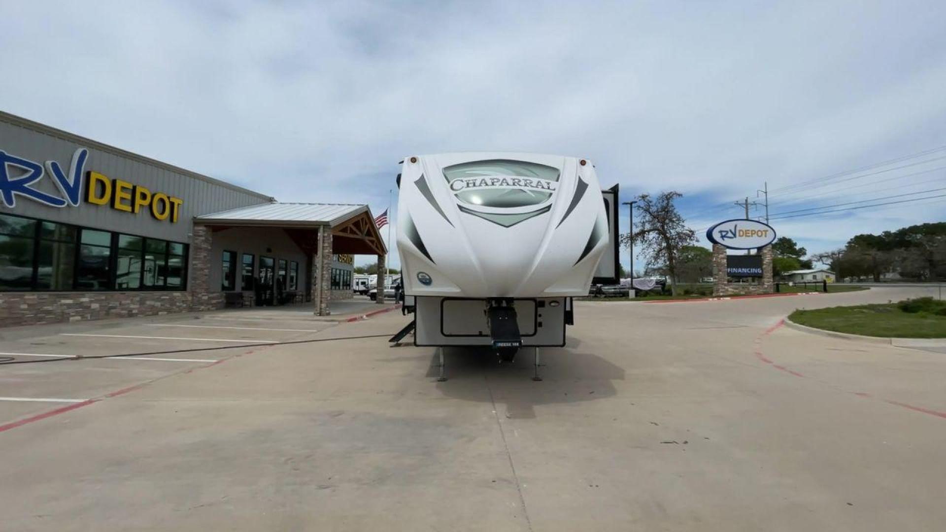 2020 FOREST RIVER CHAPARRAL 360IBL (5ZT3CH1B1LA) , Length: 39 ft. | Dry Weight: 11,450 lbs. | Gross Weight: 14,000 lbs. | Slides: 4 transmission, located at 4319 N Main St, Cleburne, TX, 76033, (817) 678-5133, 32.385960, -97.391212 - With a length of 39 feet and a dry weight of 11,450 pounds, this spacious 2020 Coachmen Chaparral 360IBL offers plenty of room for the whole family and then some. The exterior is equipped with a massive 18-foot power awning, providing ample shade and protection from the elements while you relax outs - Photo#4