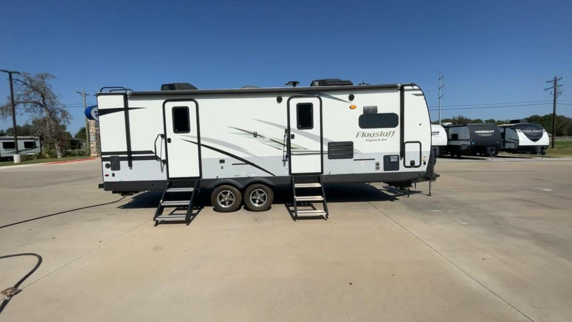 2020 FOREST RIVER FLAGSTAFF 26FKBS (4X4TFLB27LZ) , Length: 29.92 ft. | Dry Weight: 6,608 lbs. | Slides: 2 transmission, located at 4319 N Main St, Cleburne, TX, 76033, (817) 678-5133, 32.385960, -97.391212 - Photo#2