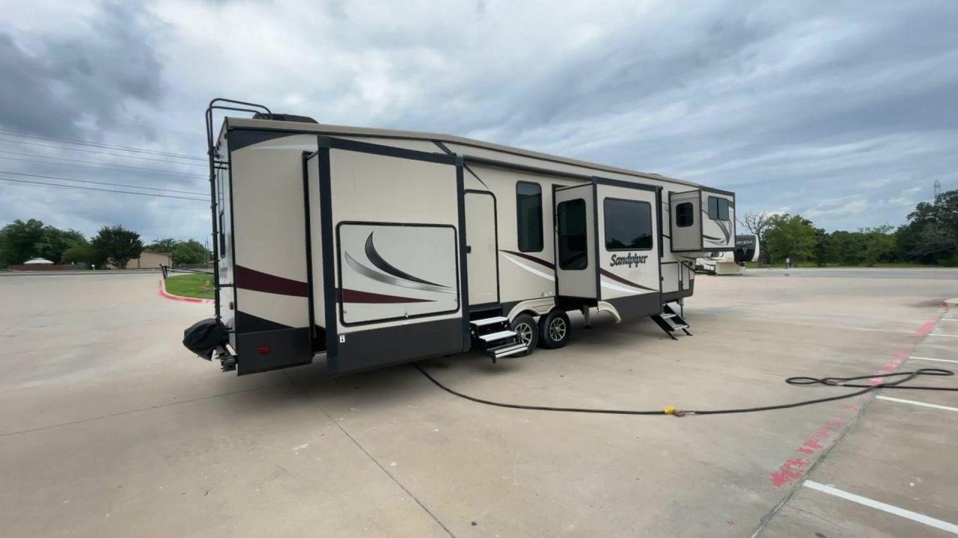 2020 FOREST RIVER SANDPIPER 379FLOK (4X4FSAP26LJ) , Length: 42.75 ft. | Dry Weight: 13,069 lbs. | Gross Weight: 16,069 lbs. | Slides: 6 transmission, located at 4319 N Main St, Cleburne, TX, 76033, (817) 678-5133, 32.385960, -97.391212 - Photo#1