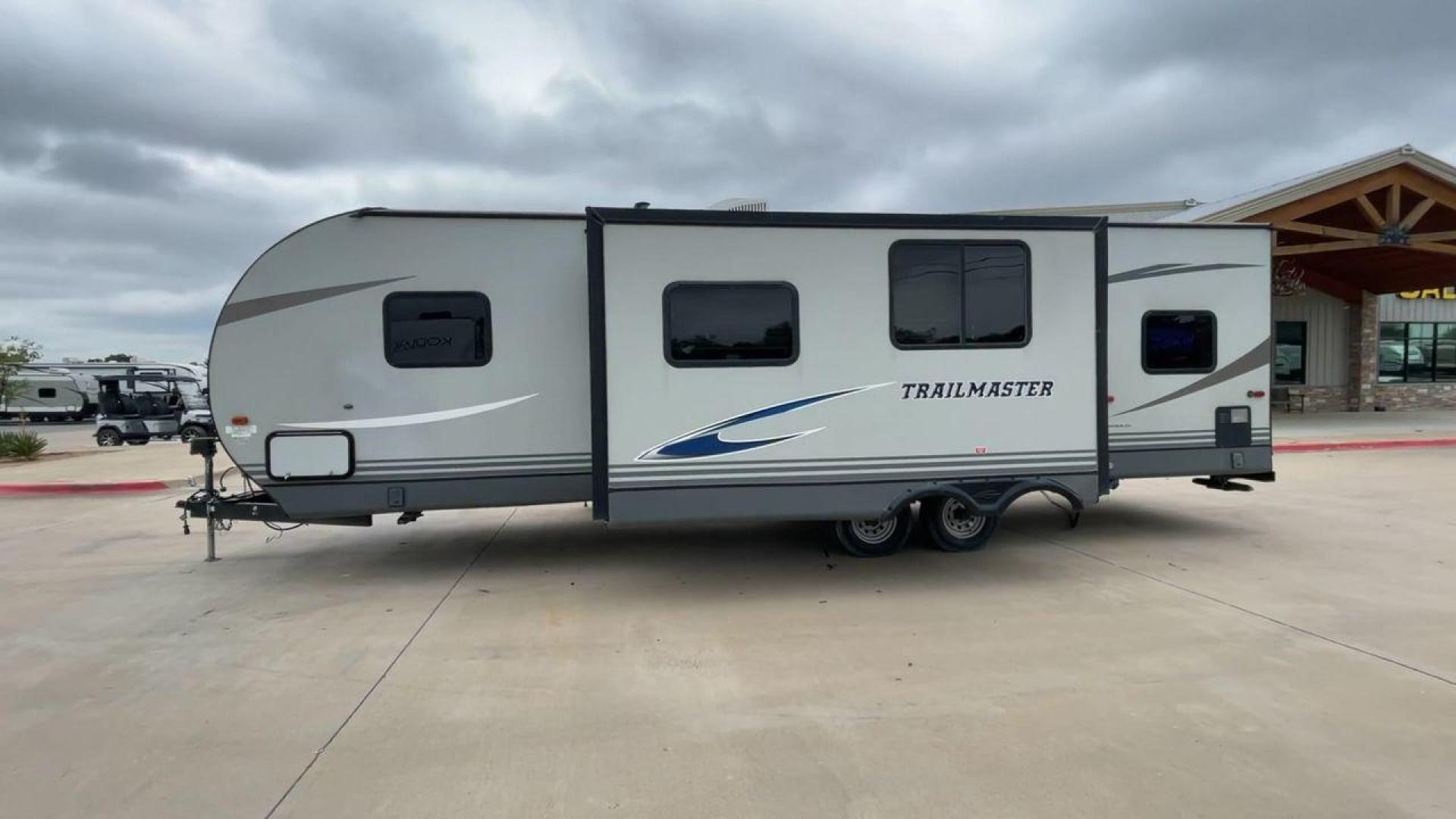 2020 WHITE GULFSTREAM TRAILMASTER 301TB (1NL1G3425L1) , Length: 34.08 ft. | Dry Weight: 6,845 lbs. | Slides: 1 transmission, located at 4319 N Main St, Cleburne, TX, 76033, (817) 678-5133, 32.385960, -97.391212 - This 2020 Gulf Stream Trailmaster 301TB travel trailer measures 34.01 feet. There are two axles with steel wheels and electric drum brakes. Its dry weight is 6,845 lbs, its payload is 2,840 lbs, and its hitch is 885 lbs. The aluminum walls are painted gray with white and dark gray graphics. The 13,5 - Photo#6