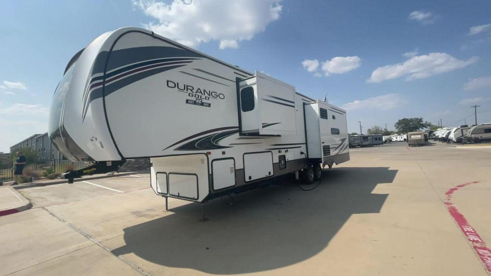 2020 K-Z DURANGO GOLD 366FBT (4EZFV4026L6) , Length: 39.83 ft. | Dry Weight: 11,470 lbs. | Gross Weight: 14,500 lbs. | Slides: 3 transmission, located at 4319 N Main St, Cleburne, TX, 76033, (817) 678-5133, 32.385960, -97.391212 - Looking for the perfect RV to explore the local driving highlights around Cleburne, TX? Look no further than this 2020 K-Z Durango Gold 366FBT available at RV Depot in Cleburne, TX. With its luxurious features and spacious design, this fifth wheel rear living vehicle is perfect for those who want to - Photo#5