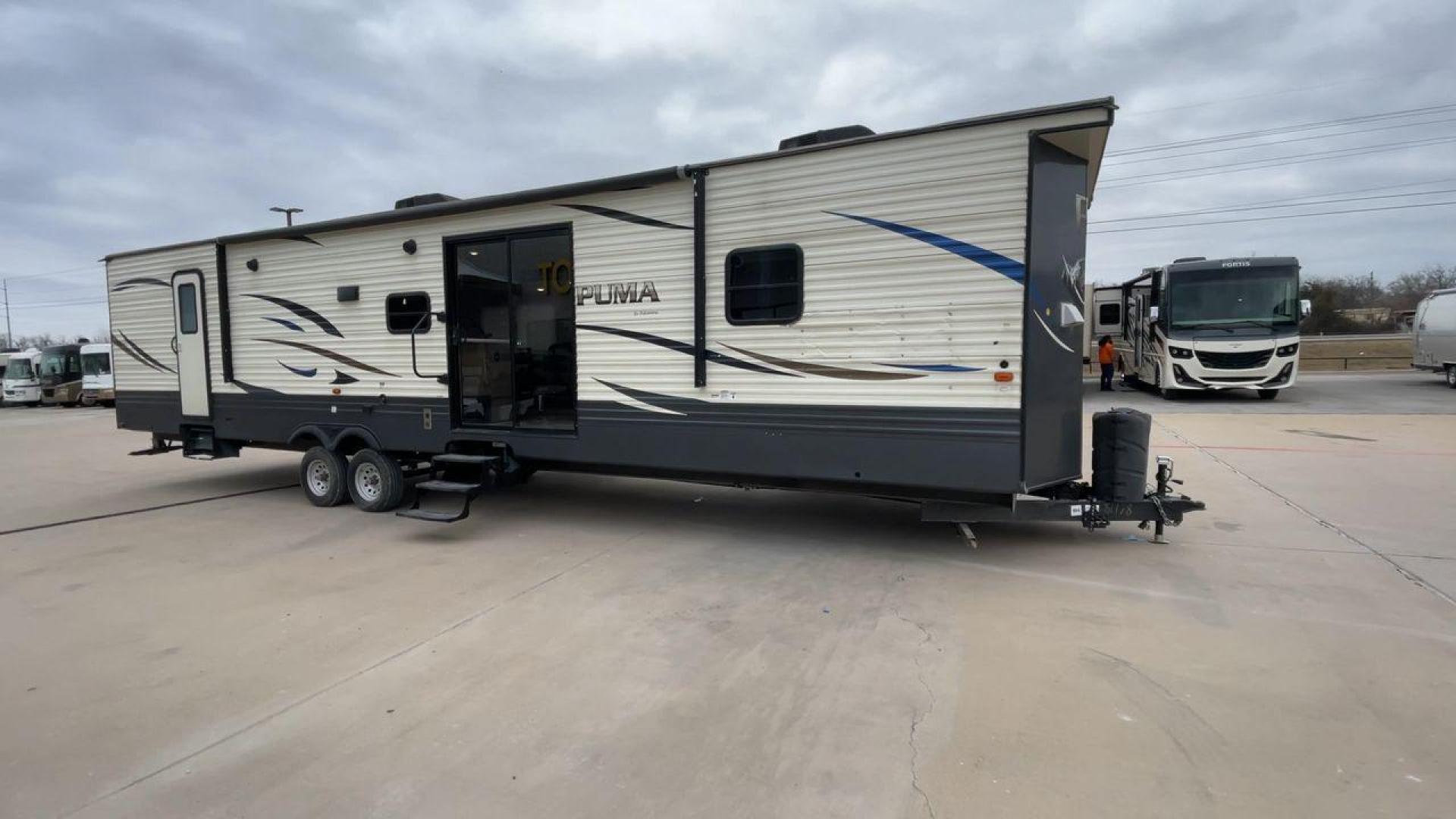 2020 NV DIGIL PUMA 38DBS - (4X4TPUP27LP) , Length: 41.92 ft | Dry Weight: 9,748 lbs. | Gross Weight: 11,522 lbs. | Slides: 3. transmission, located at 4319 N Main St, Cleburne, TX, 76033, (817) 678-5133, 32.385960, -97.391212 - With its impressive features and unbeatable price of $38,995, this RV is sure to make your road trip dreams come true. The 2020 Puma 38DBS is a spacious and stylish travel trailer designed for both comfort and functionality. Its exterior features a striking combination of cream and gray tones with s - Photo#3