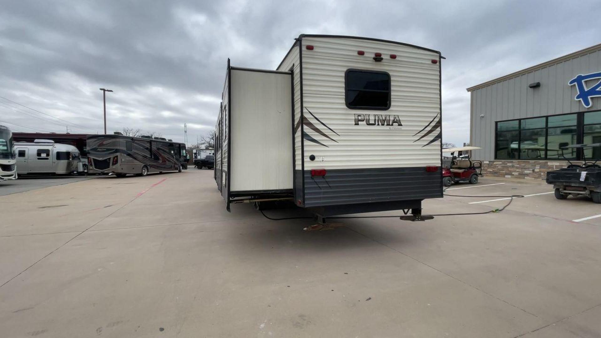 2020 NV DIGIL PUMA 38DBS - (4X4TPUP27LP) , Length: 41.92 ft | Dry Weight: 9,748 lbs. | Gross Weight: 11,522 lbs. | Slides: 3. transmission, located at 4319 N Main St, Cleburne, TX, 76033, (817) 678-5133, 32.385960, -97.391212 - With its impressive features and unbeatable price of $38,995, this RV is sure to make your road trip dreams come true. The 2020 Puma 38DBS is a spacious and stylish travel trailer designed for both comfort and functionality. Its exterior features a striking combination of cream and gray tones with s - Photo#8